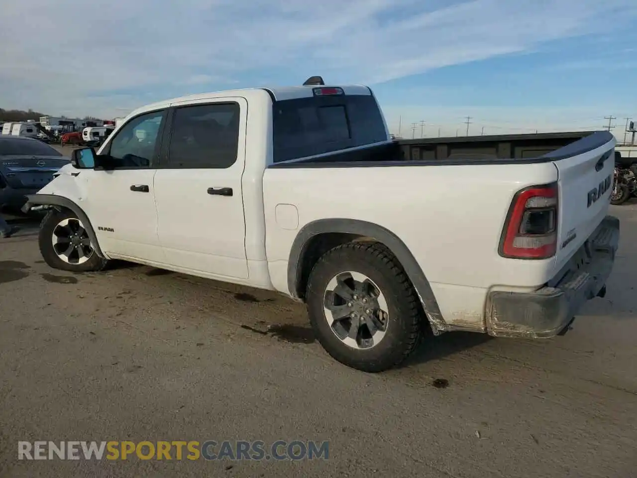 2 fotografías del automóvil dañado 1C6SRFLT7NN379880 RAM 1500 2022