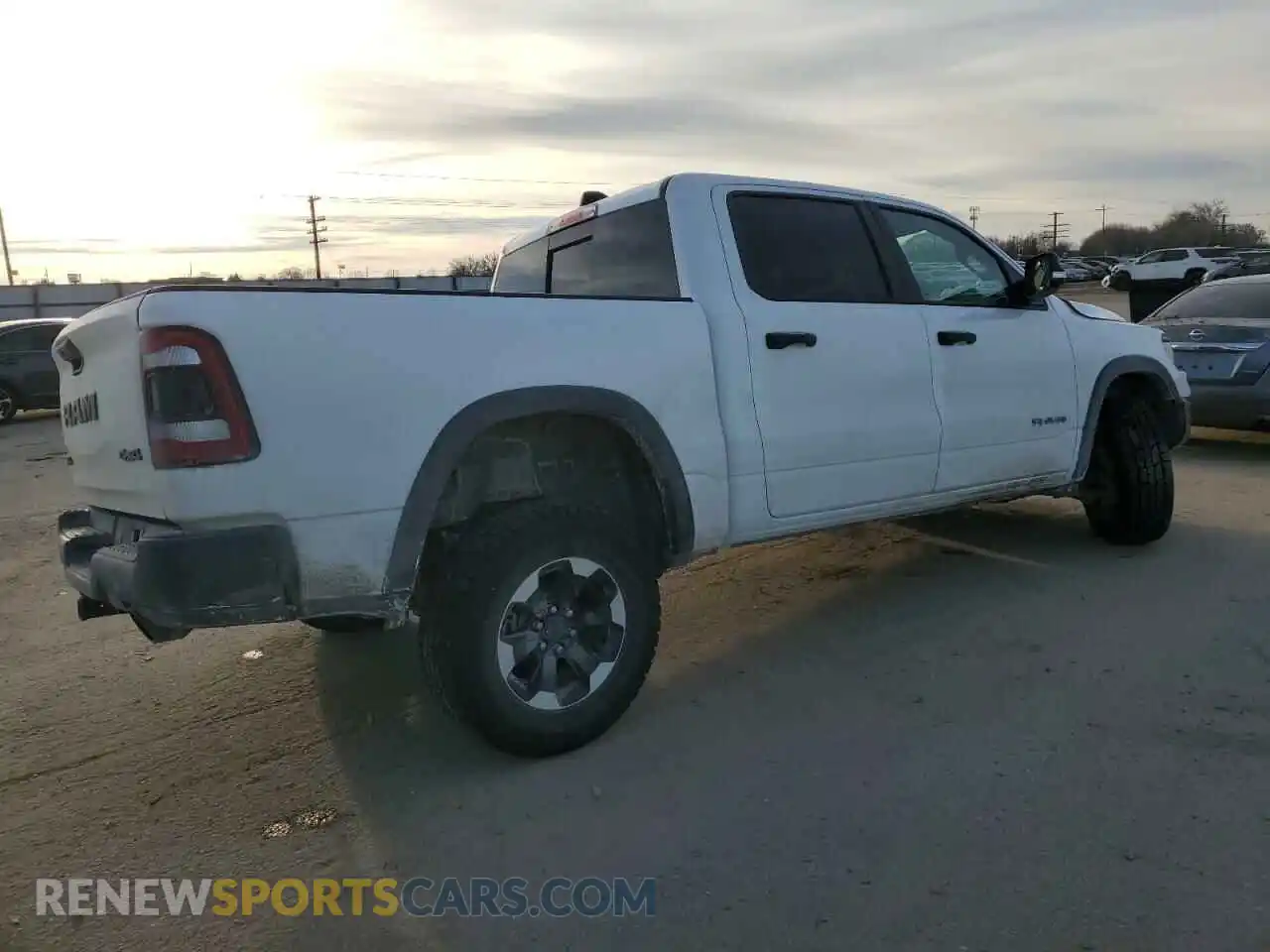 3 fotografías del automóvil dañado 1C6SRFLT7NN379880 RAM 1500 2022