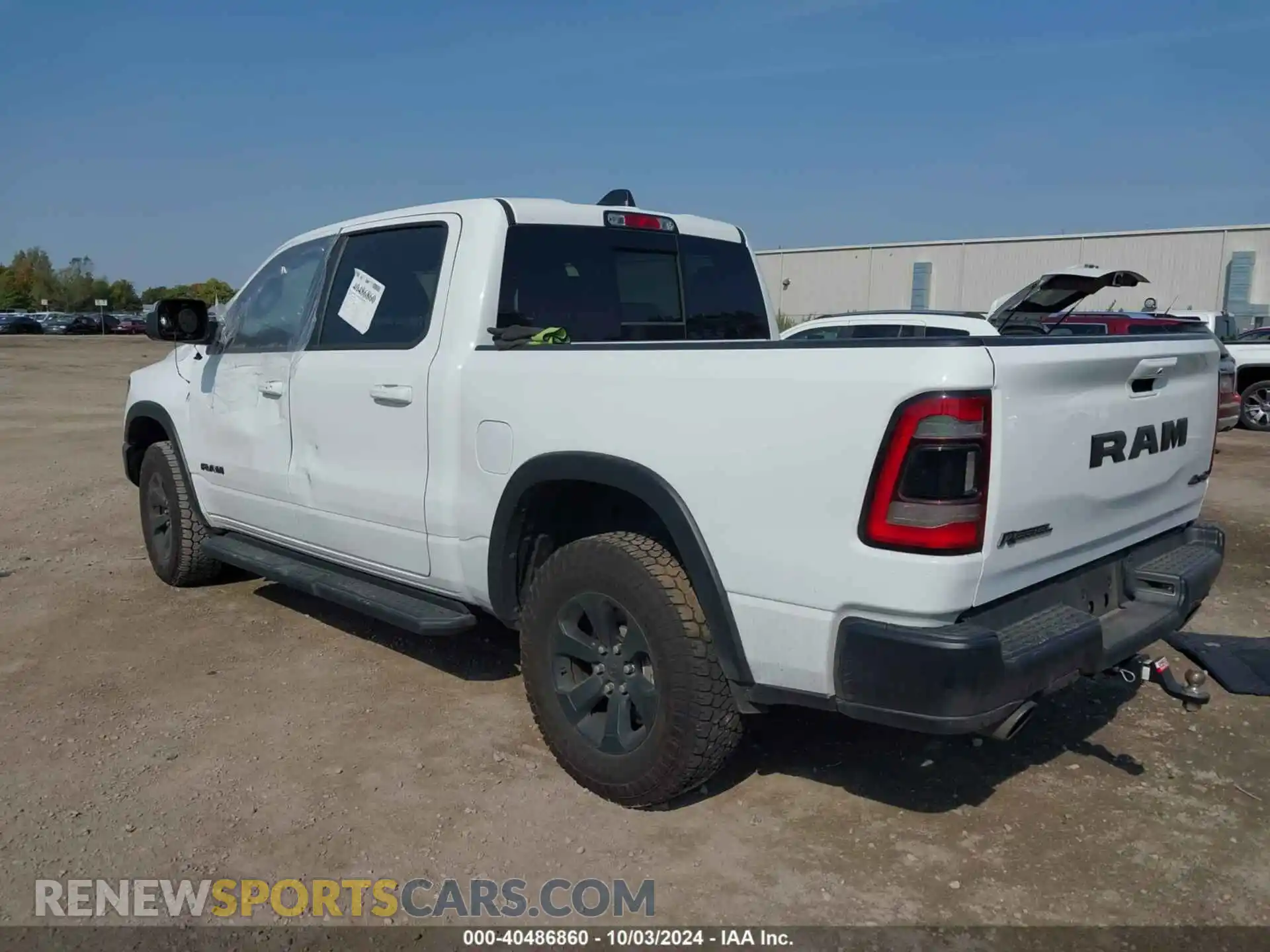 3 Photograph of a damaged car 1C6SRFLTXNN338532 RAM 1500 2022