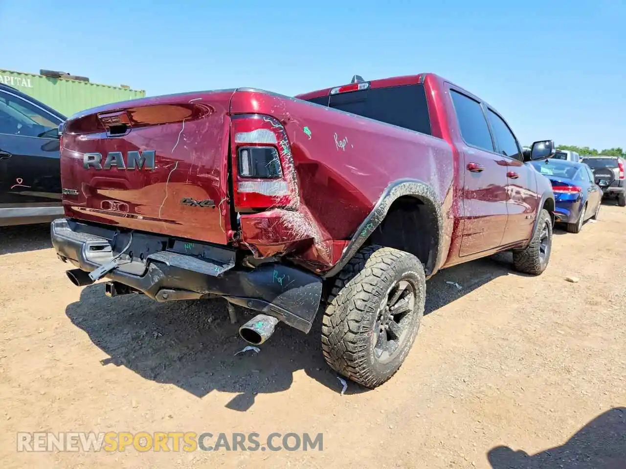 3 Photograph of a damaged car 1C6SRFLTXNN470352 RAM 1500 2022