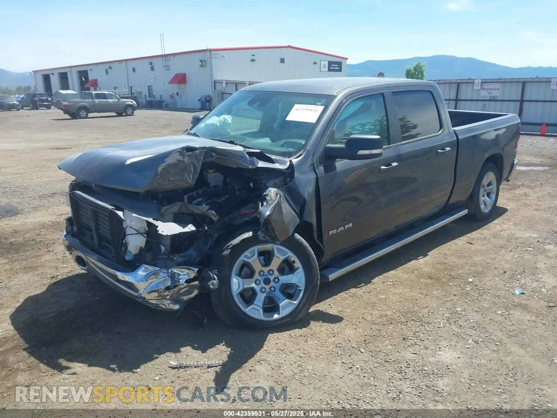 2 Photograph of a damaged car 1C6SRFMT8NN481607 RAM 1500 2022