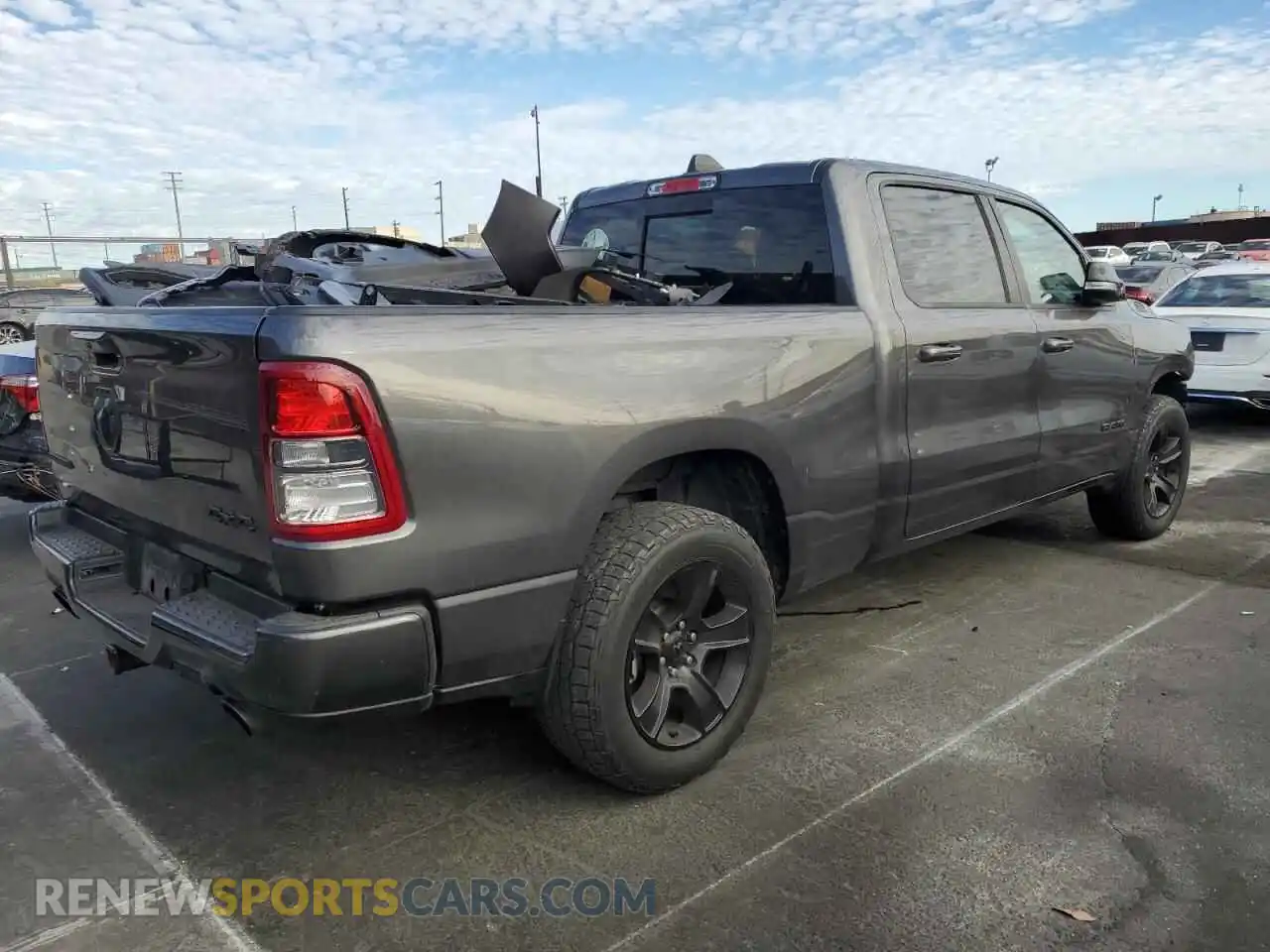 3 Photograph of a damaged car 1C6SRFMT9NN155881 RAM 1500 2022