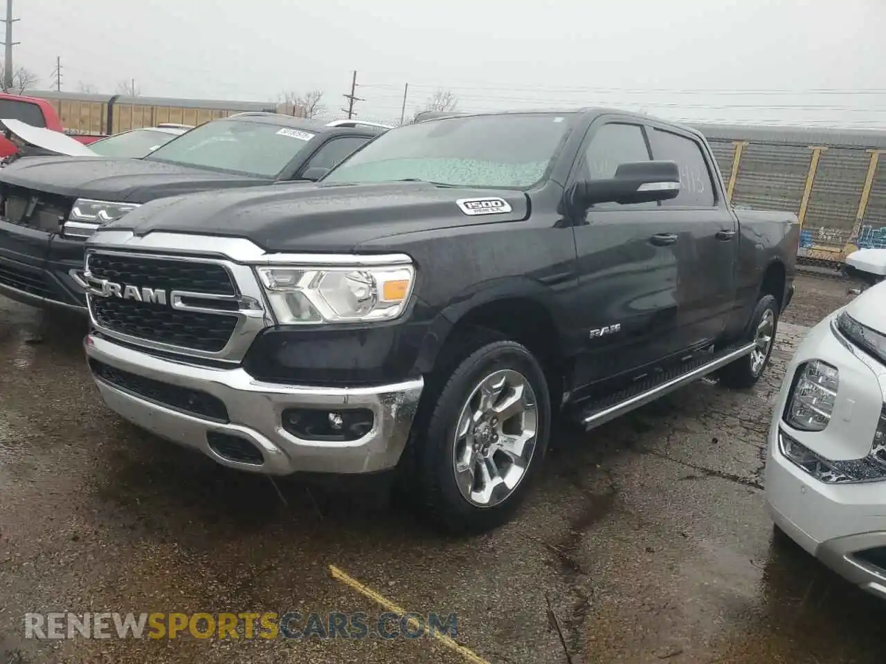 1 Photograph of a damaged car 1C6SRFMTXNN142413 RAM 1500 2022