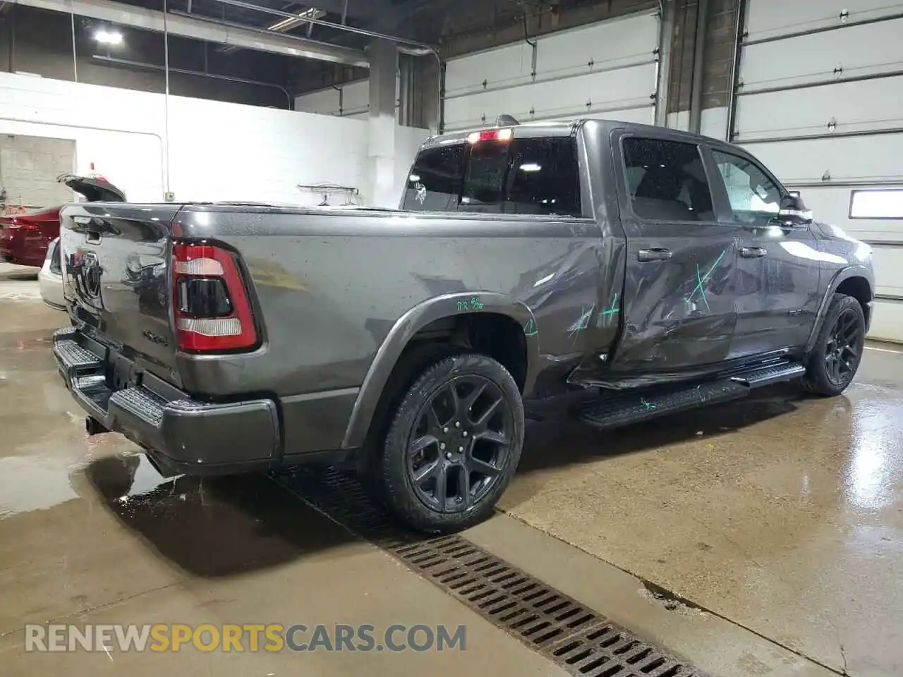 3 Photograph of a damaged car 1C6SRFRT3NN319182 RAM 1500 2022