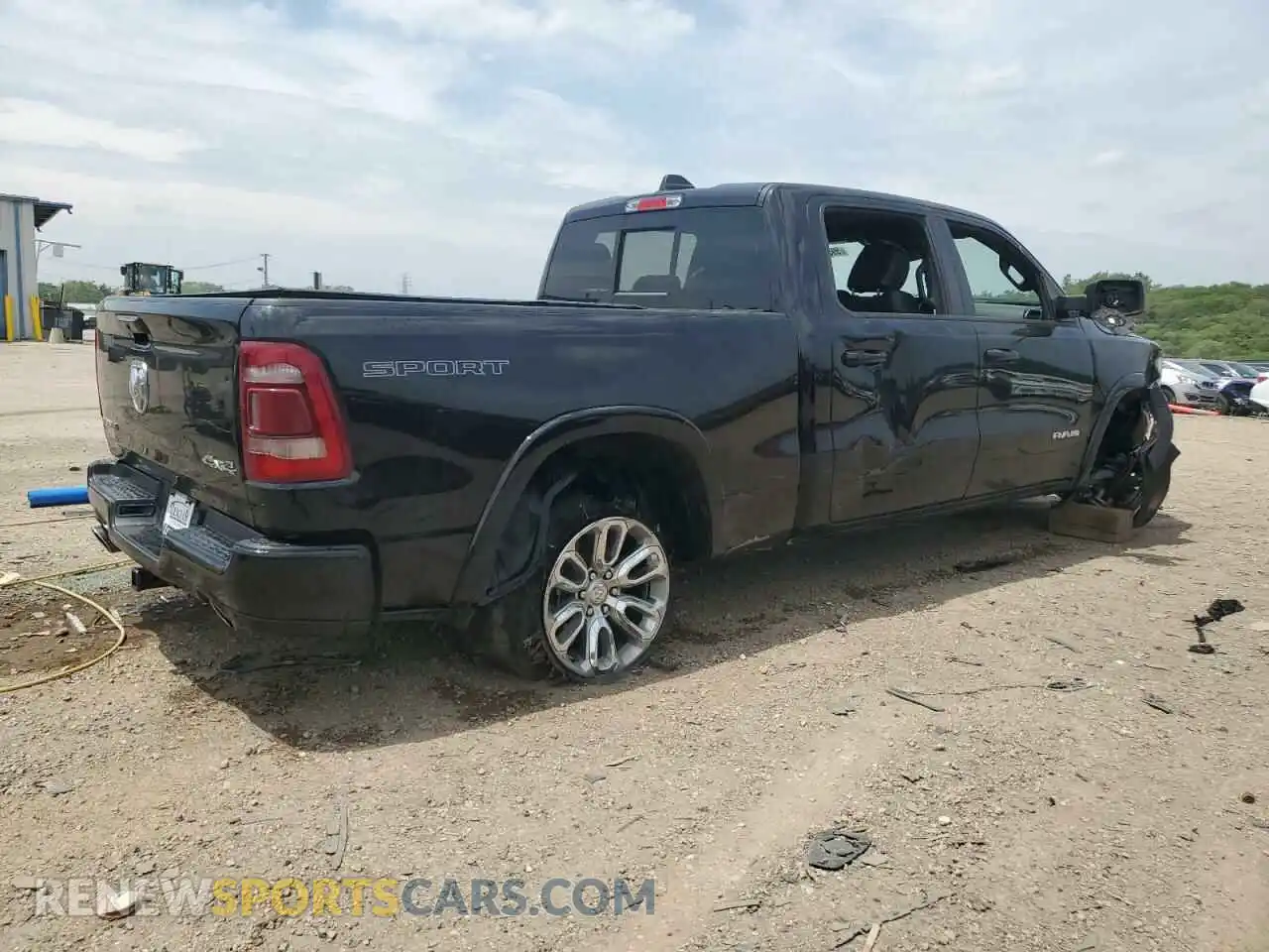 3 Photograph of a damaged car 1C6SRFRTXNN417612 RAM 1500 2022