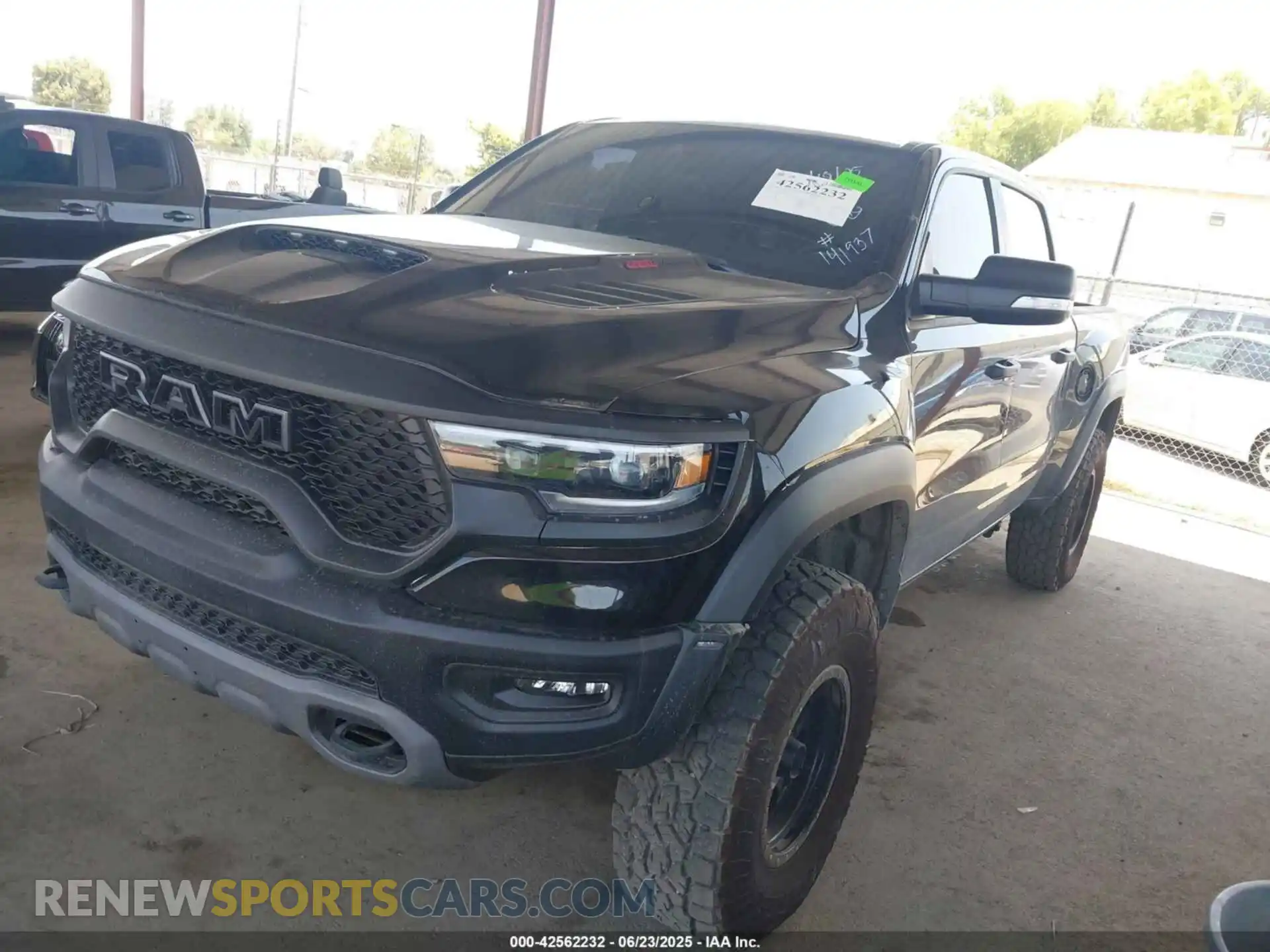 2 Photograph of a damaged car 1C6SRFU90NN369047 RAM 1500 2022