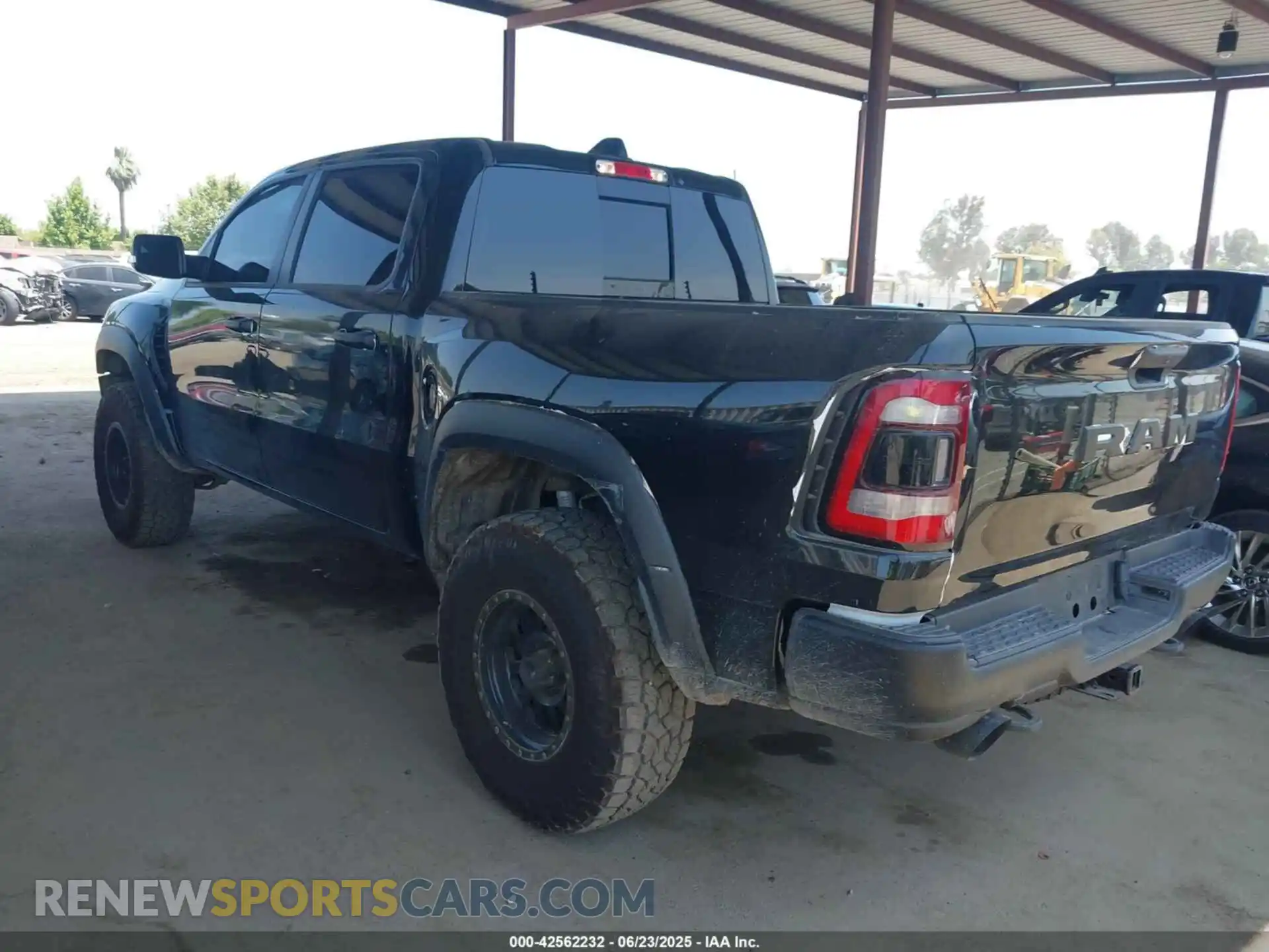 3 Photograph of a damaged car 1C6SRFU90NN369047 RAM 1500 2022
