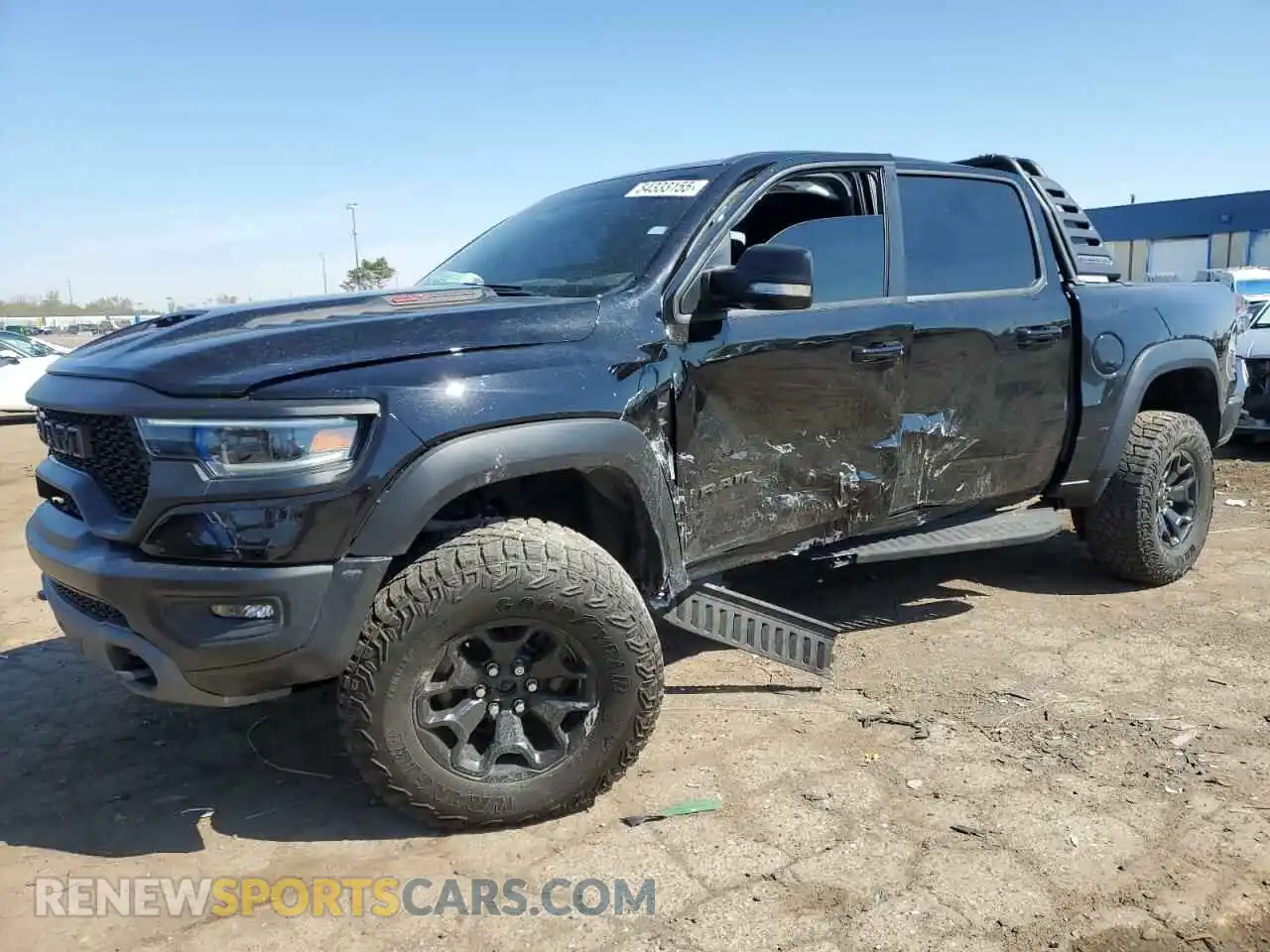 1 Photograph of a damaged car 1C6SRFU91NN112513 RAM 1500 2022