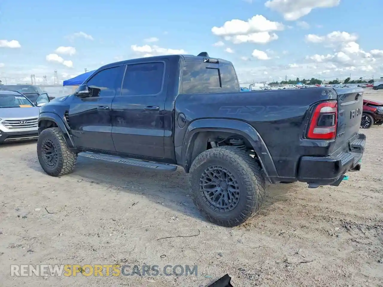 2 Photograph of a damaged car 1C6SRFU91NN318270 RAM 1500 2022