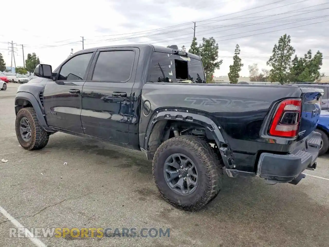 2 Photograph of a damaged car 1C6SRFU91NN424573 RAM 1500 2022