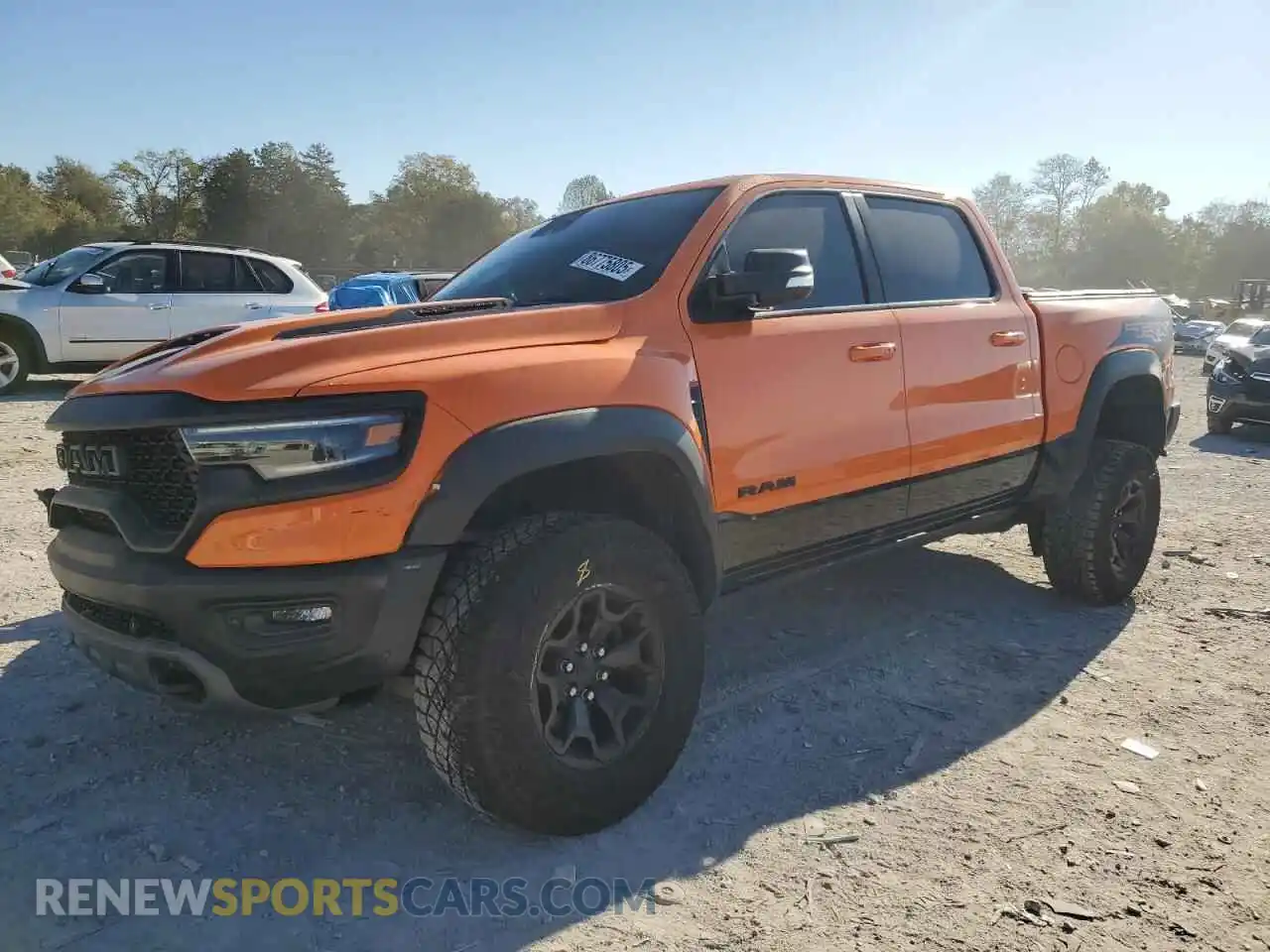 1 Photograph of a damaged car 1C6SRFU92NN148968 RAM 1500 2022