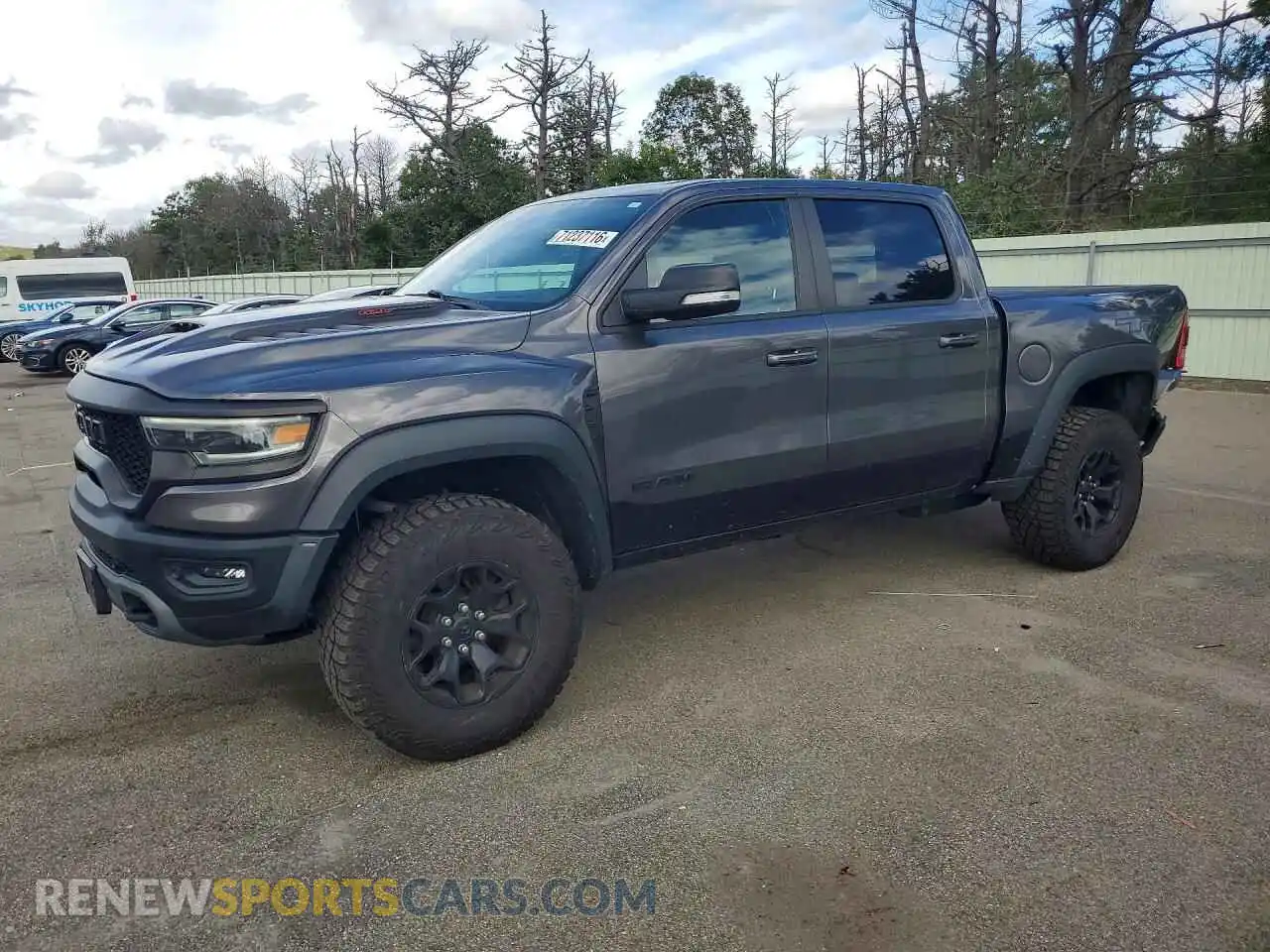 1 Photograph of a damaged car 1C6SRFU92NN186846 RAM 1500 2022