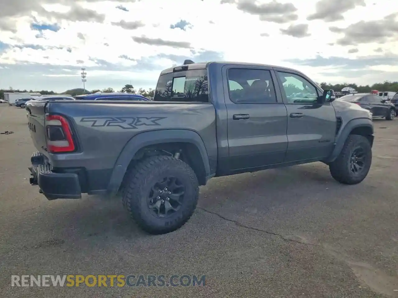 3 Photograph of a damaged car 1C6SRFU92NN186846 RAM 1500 2022