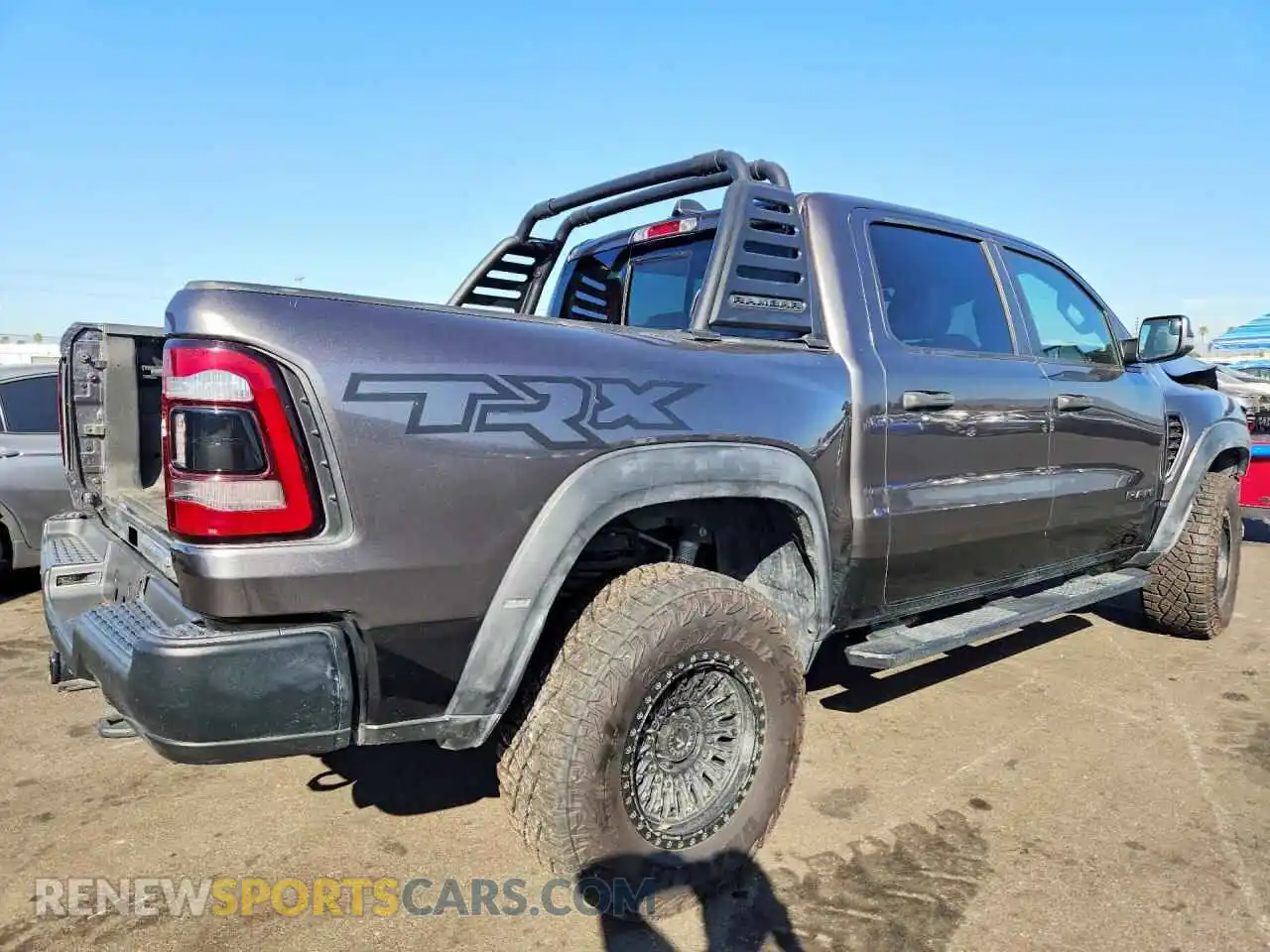 3 Photograph of a damaged car 1C6SRFU93NN150311 RAM 1500 2022