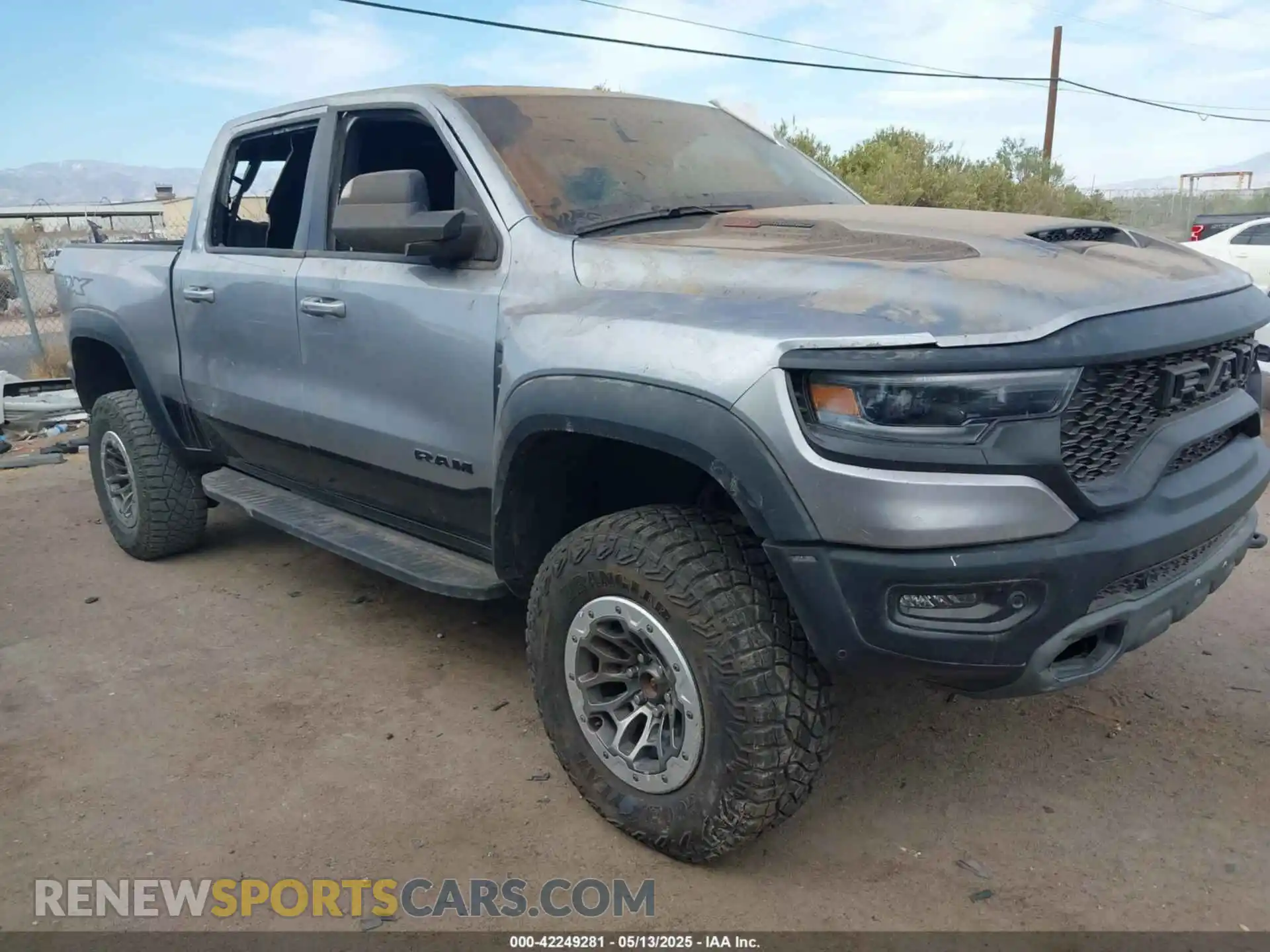 1 Photograph of a damaged car 1C6SRFU93NN246262 RAM 1500 2022