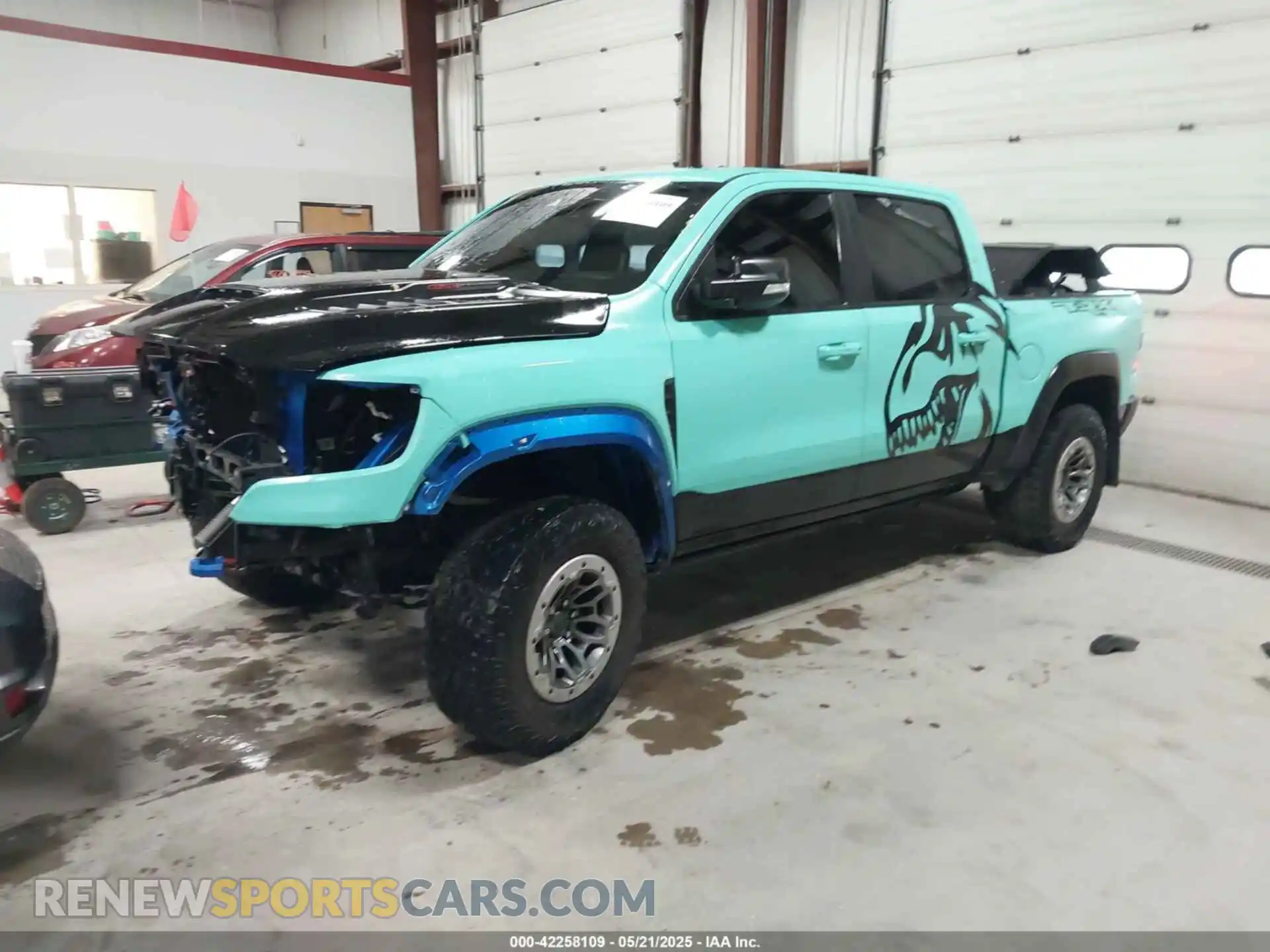 2 Photograph of a damaged car 1C6SRFU93NN368958 RAM 1500 2022