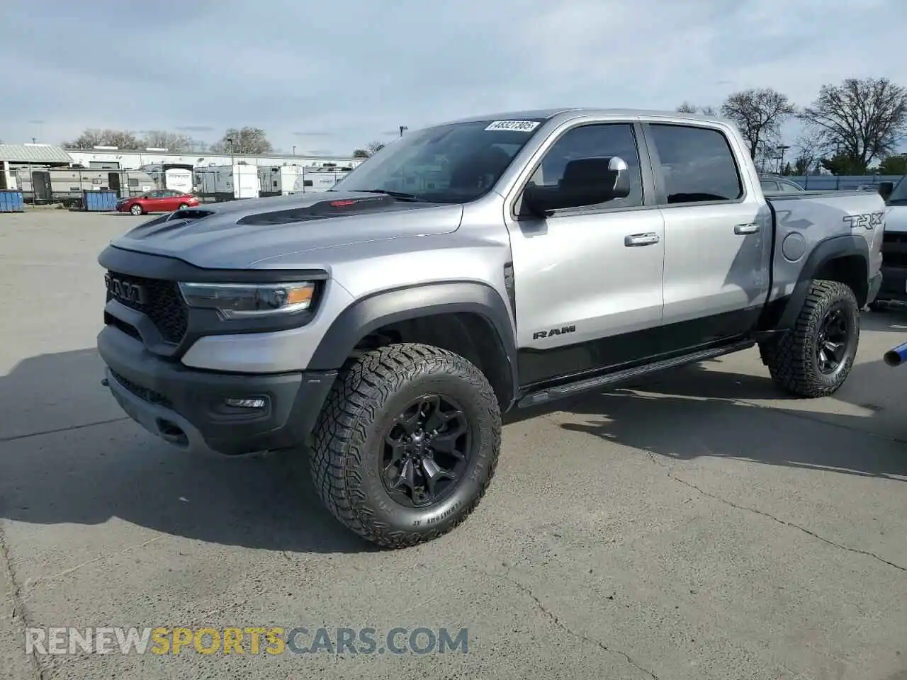 1 Photograph of a damaged car 1C6SRFU93NN402994 RAM 1500 2022