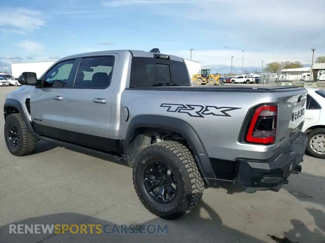 2 Photograph of a damaged car 1C6SRFU93NN402994 RAM 1500 2022