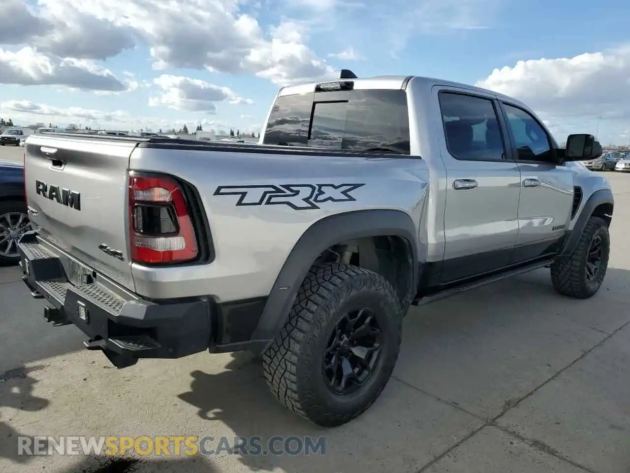 3 Photograph of a damaged car 1C6SRFU93NN402994 RAM 1500 2022