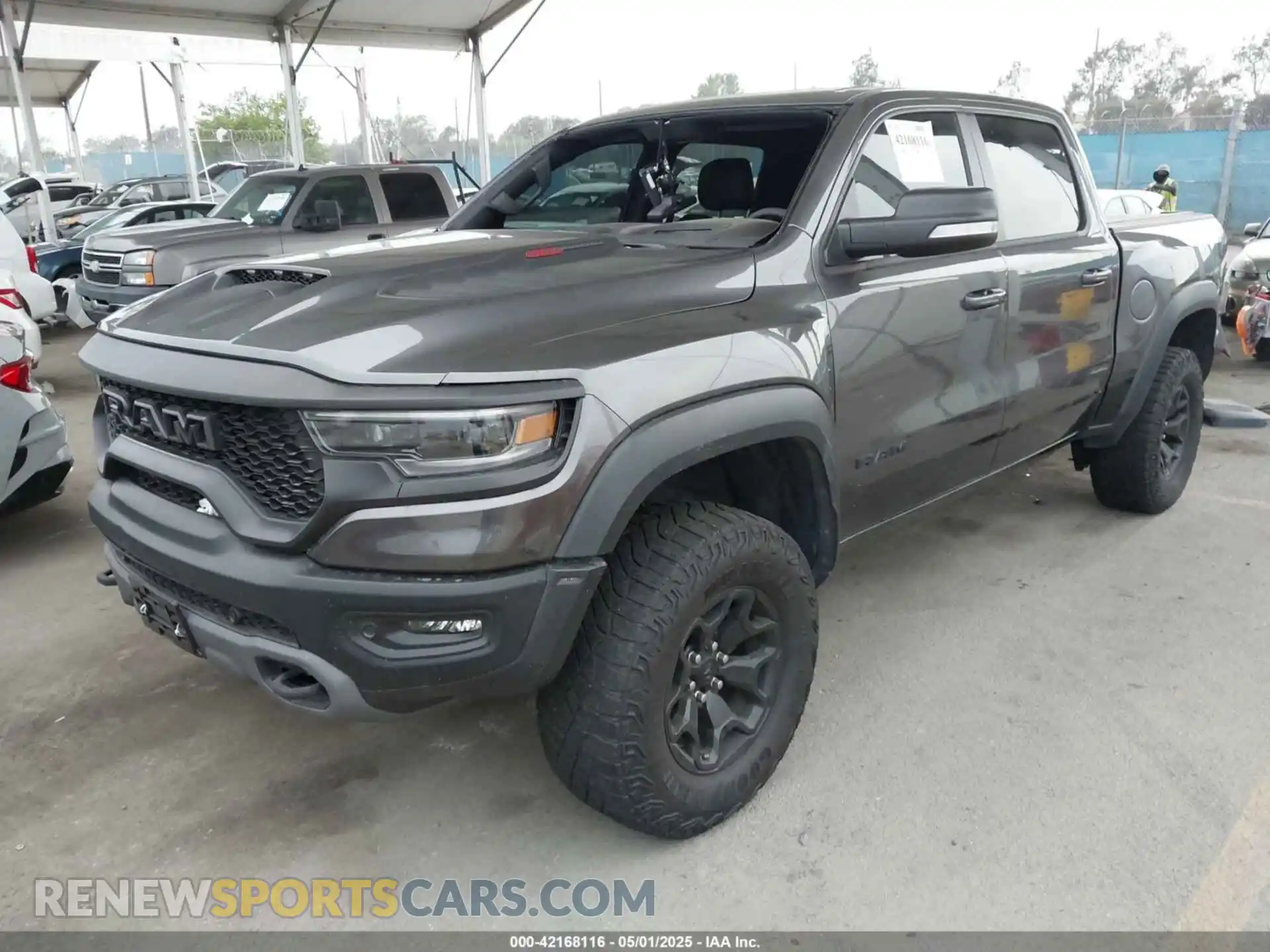 2 Photograph of a damaged car 1C6SRFU93NN415194 RAM 1500 2022