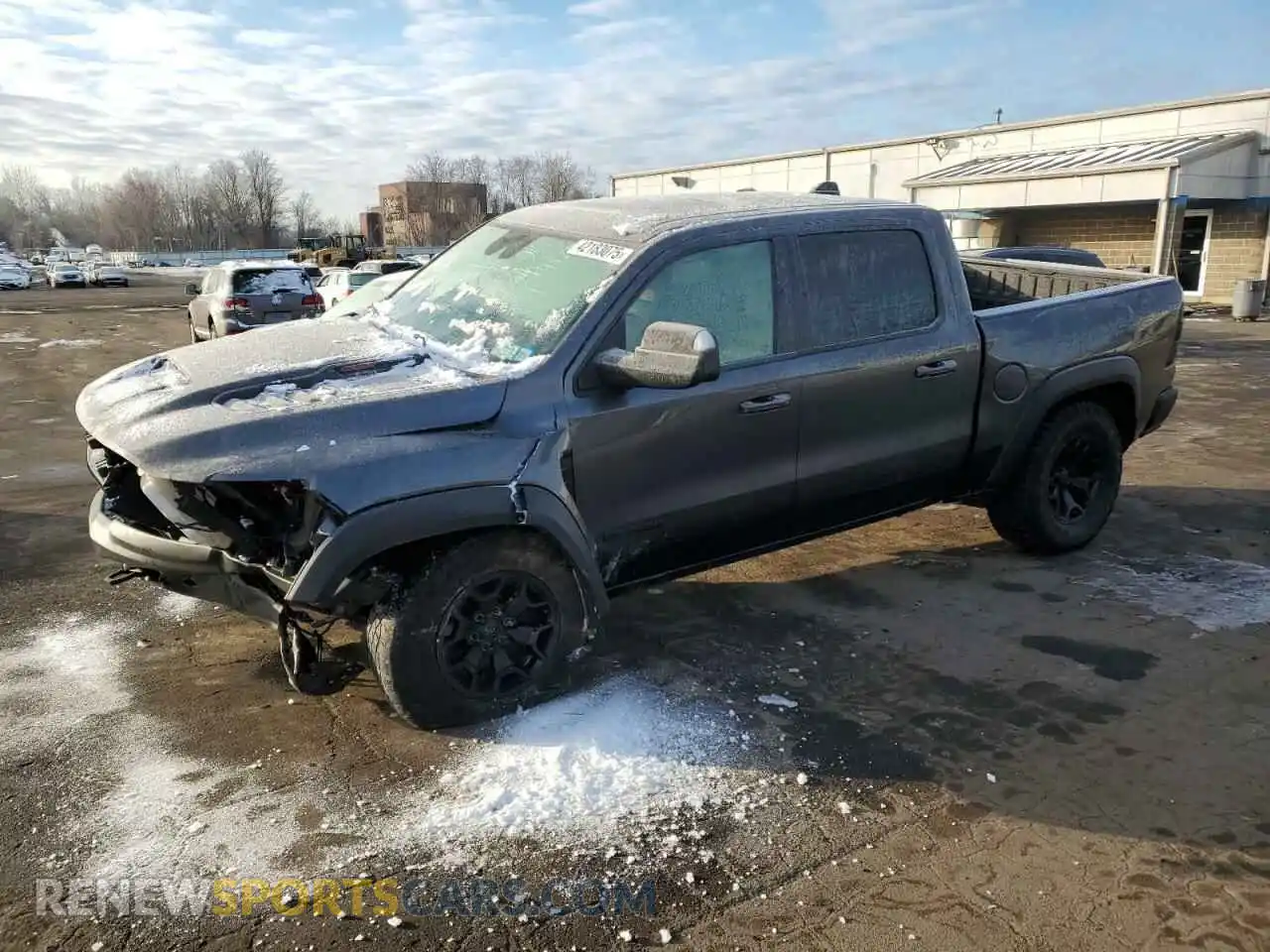 1 Photograph of a damaged car 1C6SRFU94NN265242 RAM 1500 2022
