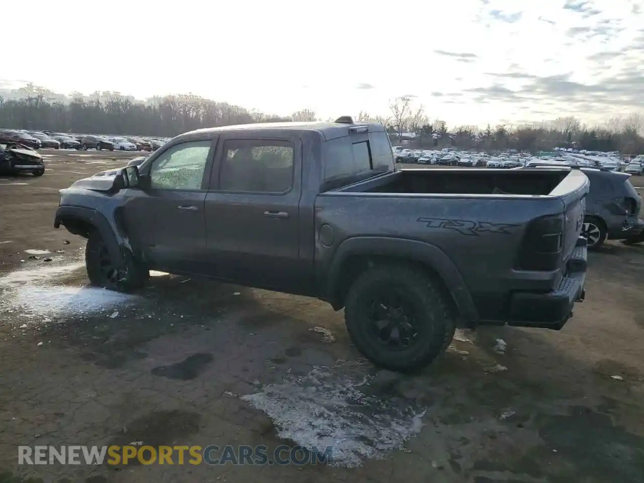 2 Photograph of a damaged car 1C6SRFU94NN265242 RAM 1500 2022