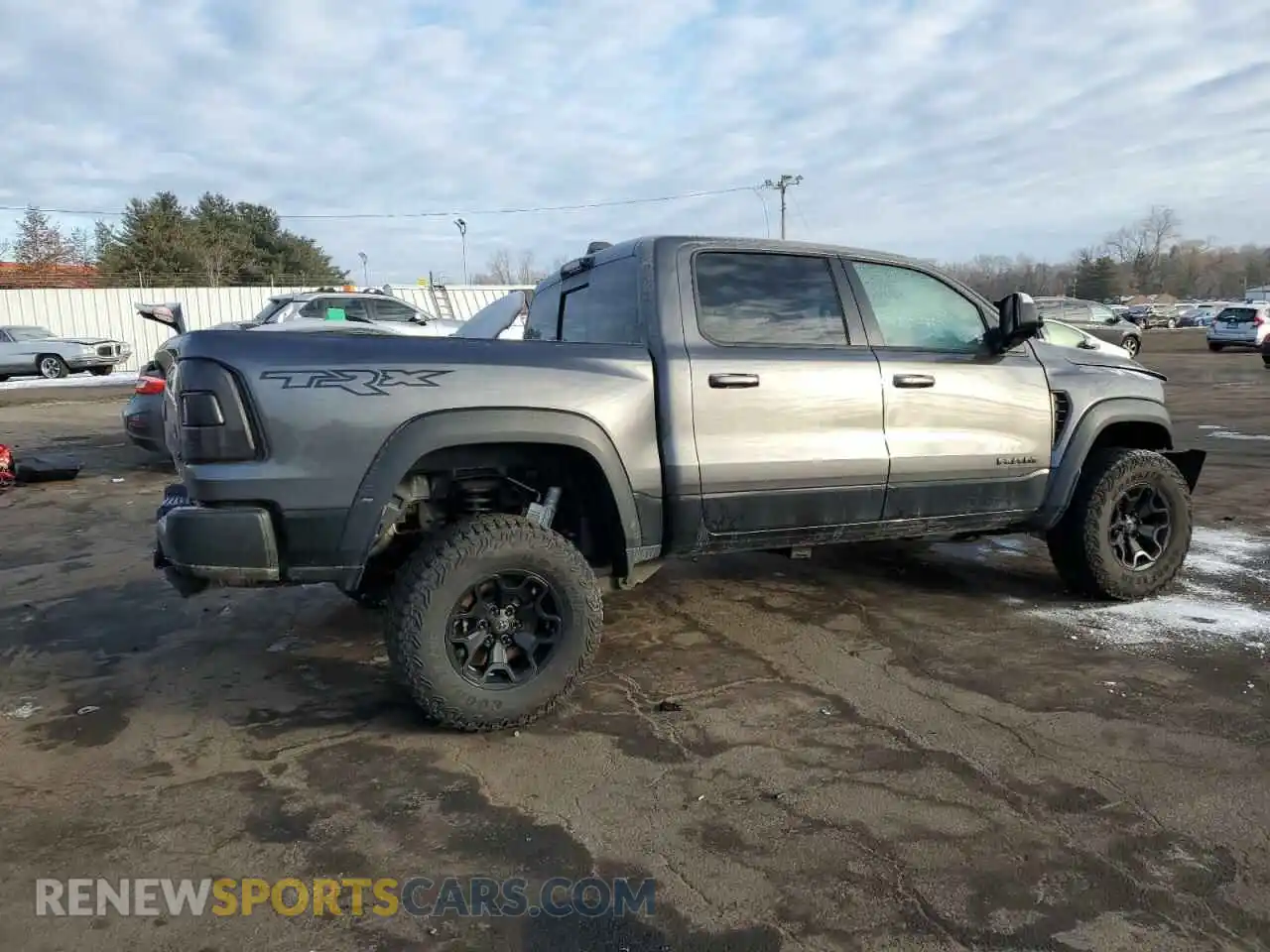 3 Photograph of a damaged car 1C6SRFU94NN265242 RAM 1500 2022