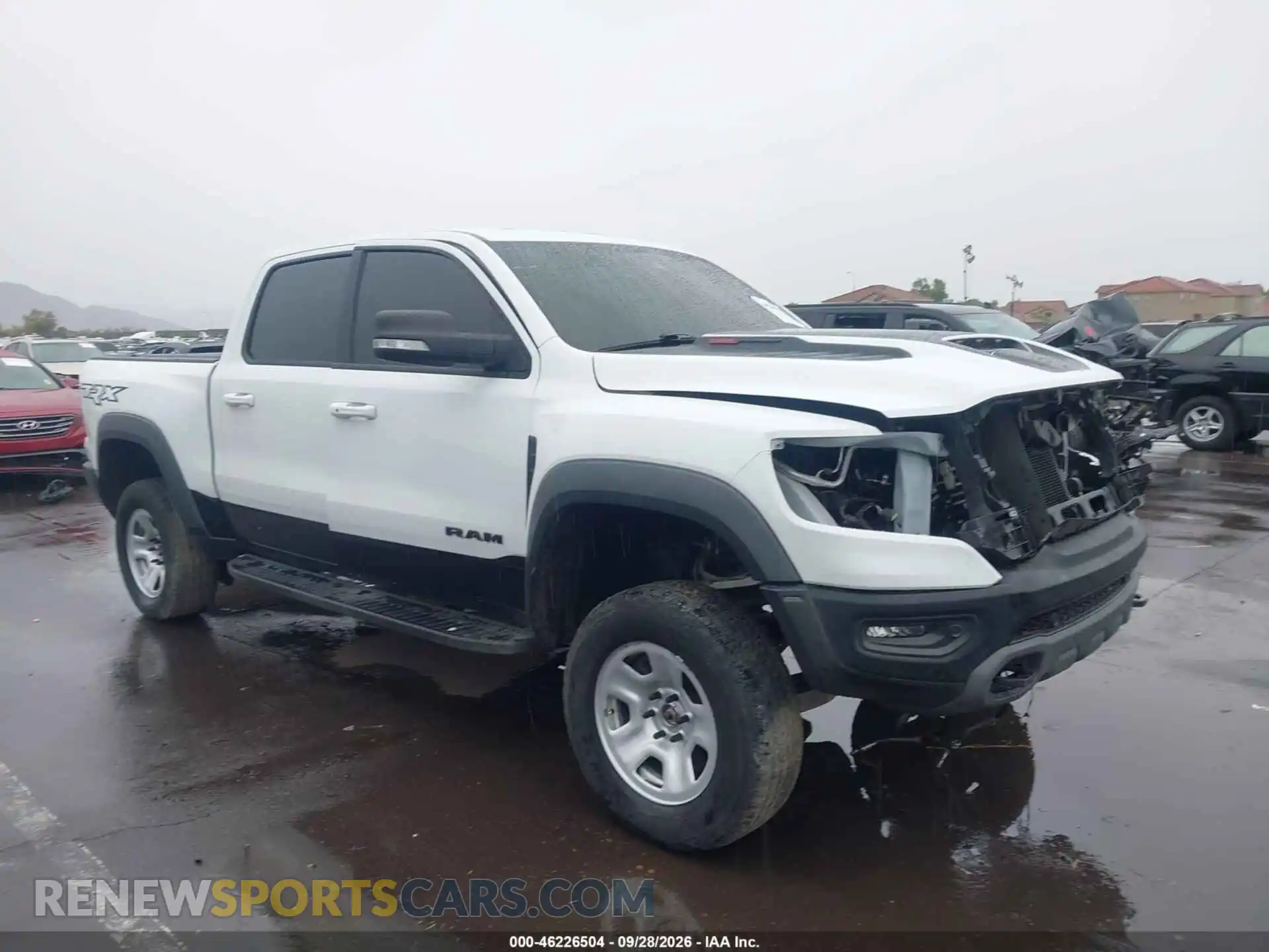 1 Photograph of a damaged car 1C6SRFU94NN303777 RAM 1500 2022