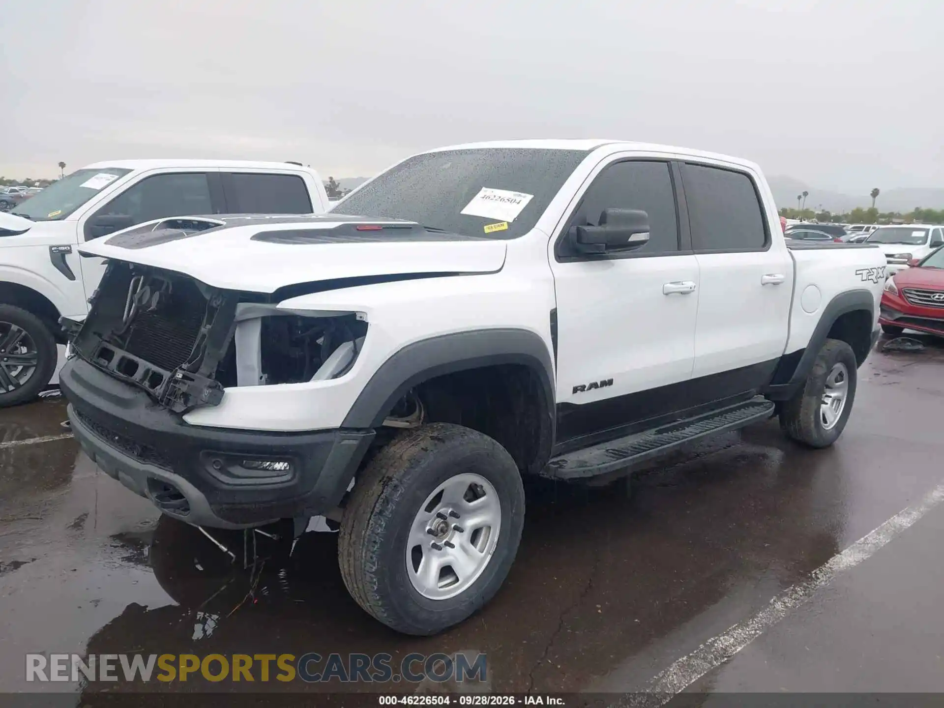 2 Photograph of a damaged car 1C6SRFU94NN303777 RAM 1500 2022
