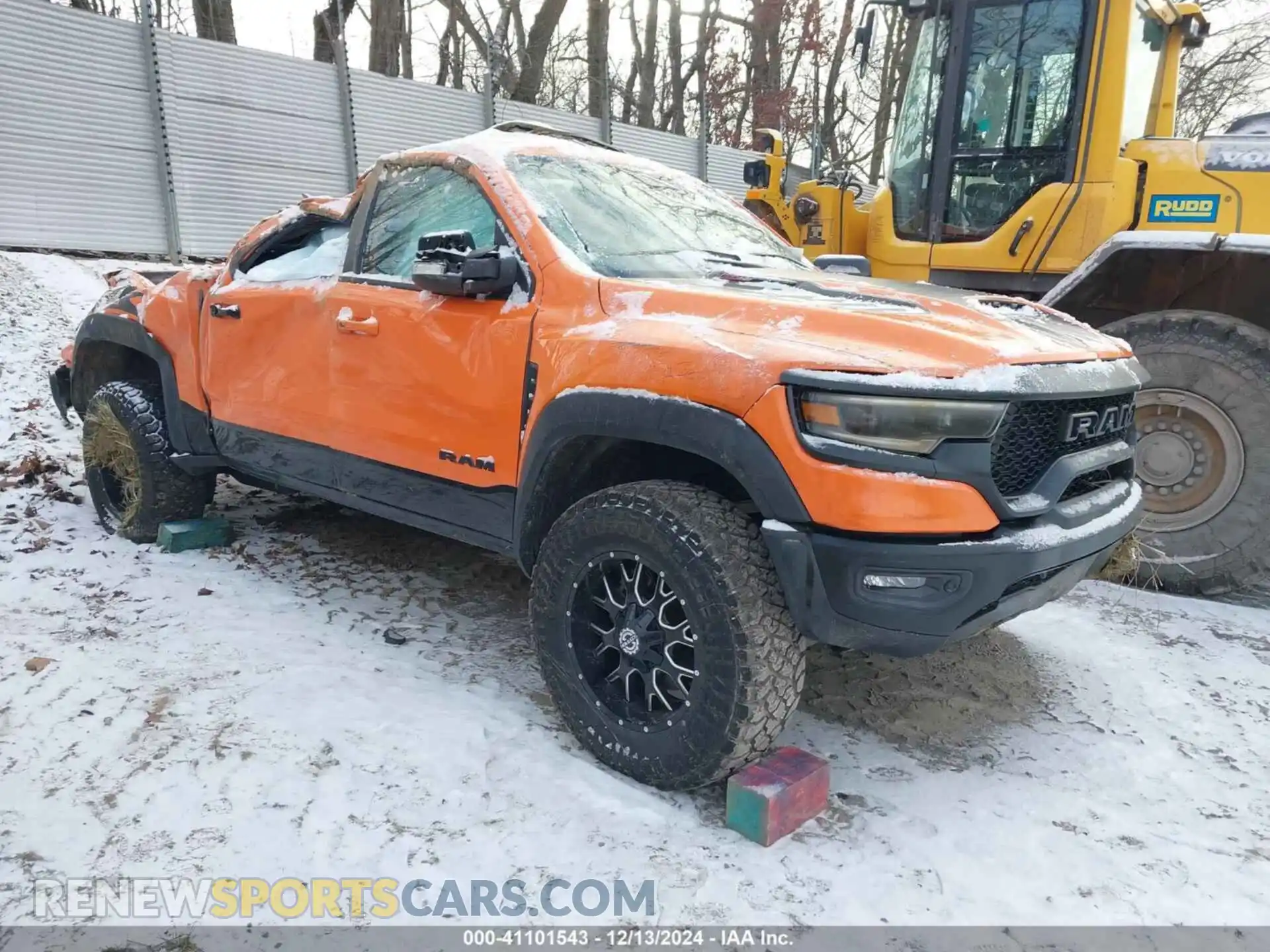 1 Photograph of a damaged car 1C6SRFU95NN149029 RAM 1500 2022