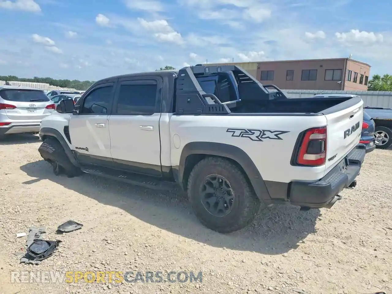 2 Photograph of a damaged car 1C6SRFU95NN215644 RAM 1500 2022
