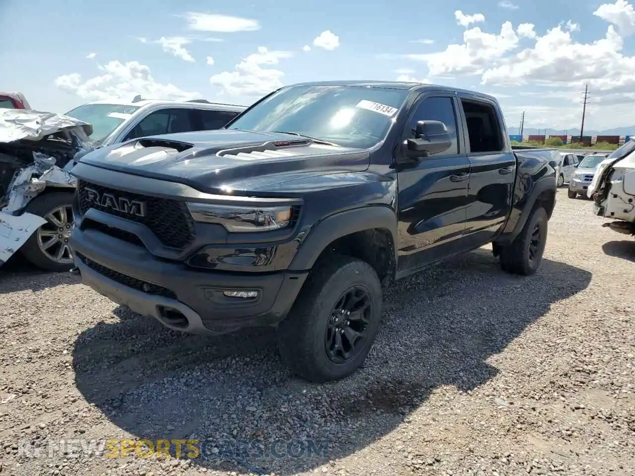1 Photograph of a damaged car 1C6SRFU95NN318630 RAM 1500 2022
