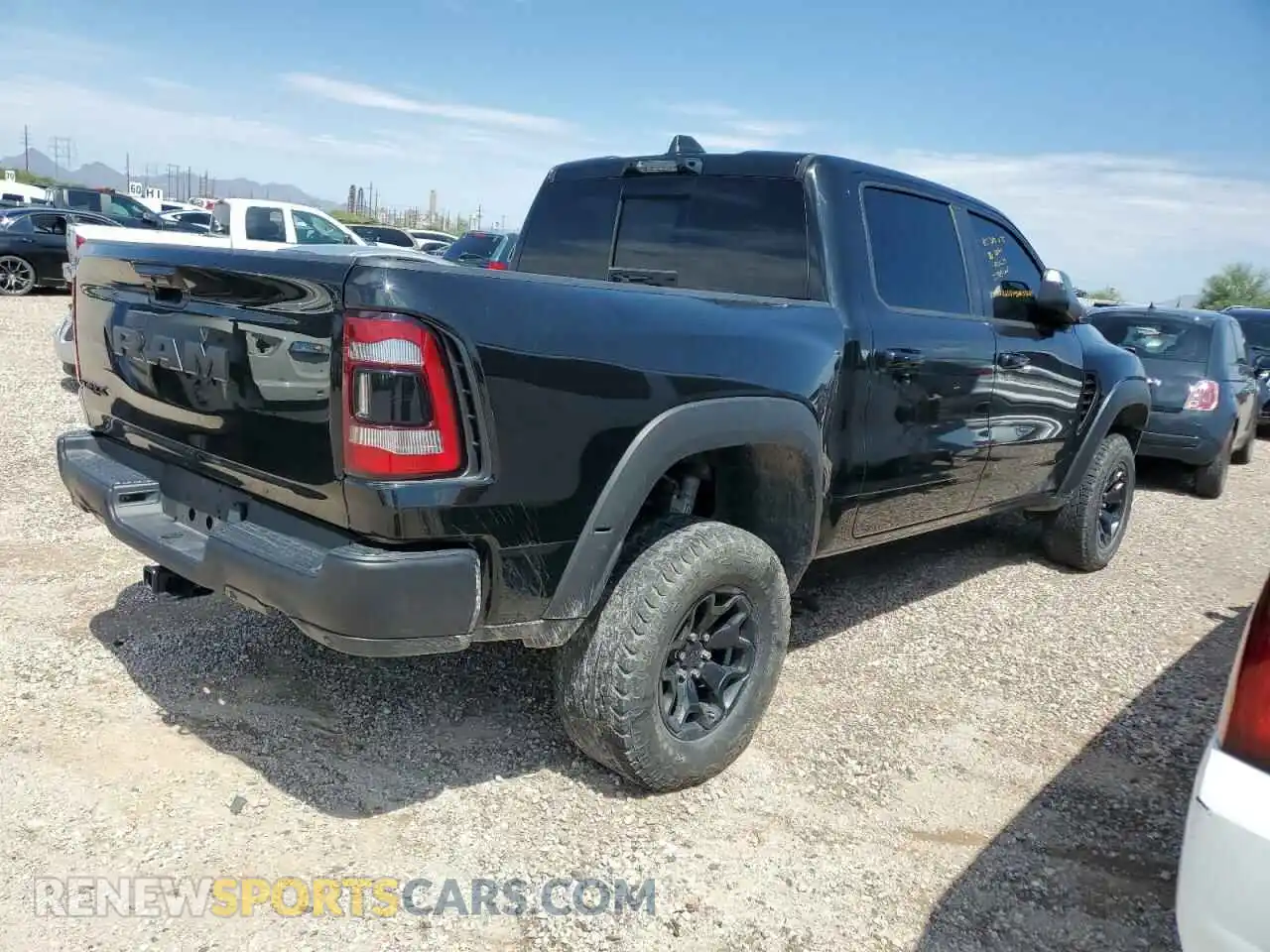 3 Photograph of a damaged car 1C6SRFU95NN318630 RAM 1500 2022