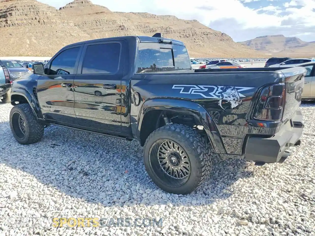 2 Photograph of a damaged car 1C6SRFU96NN216284 RAM 1500 2022