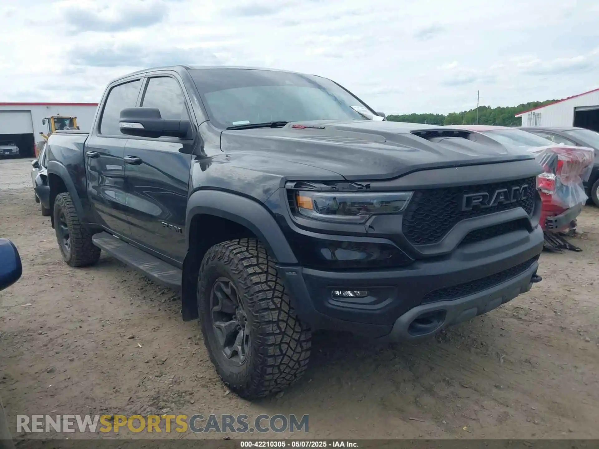 1 Photograph of a damaged car 1C6SRFU97NN112337 RAM 1500 2022