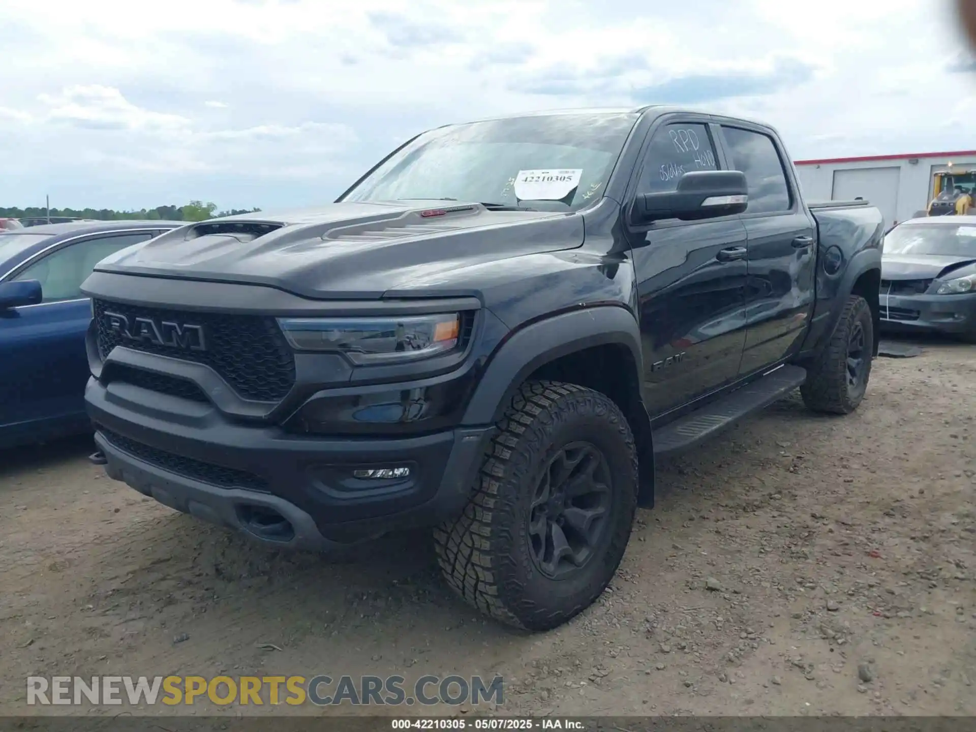 2 Photograph of a damaged car 1C6SRFU97NN112337 RAM 1500 2022