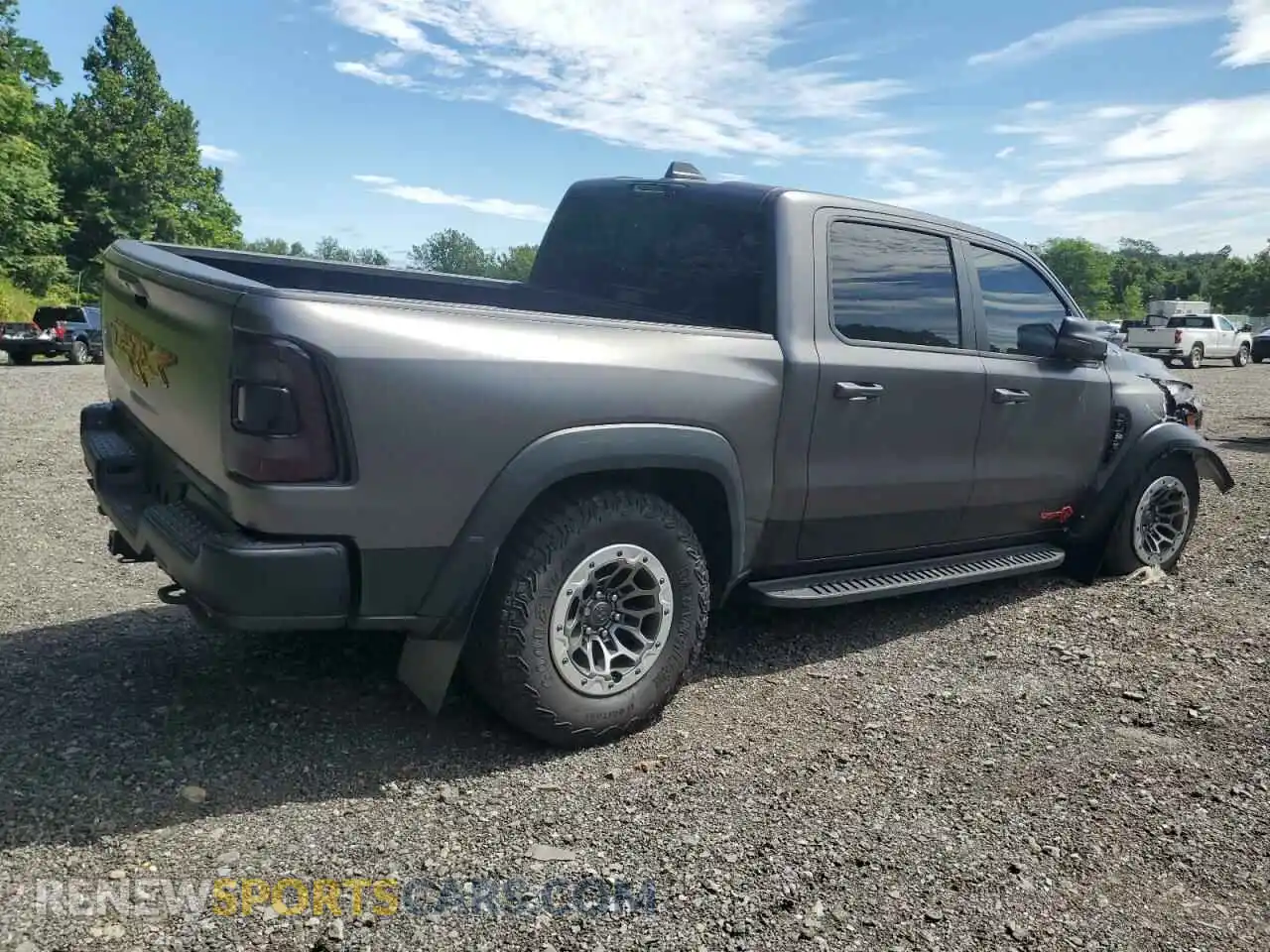 3 Photograph of a damaged car 1C6SRFU97NN168326 RAM 1500 2022