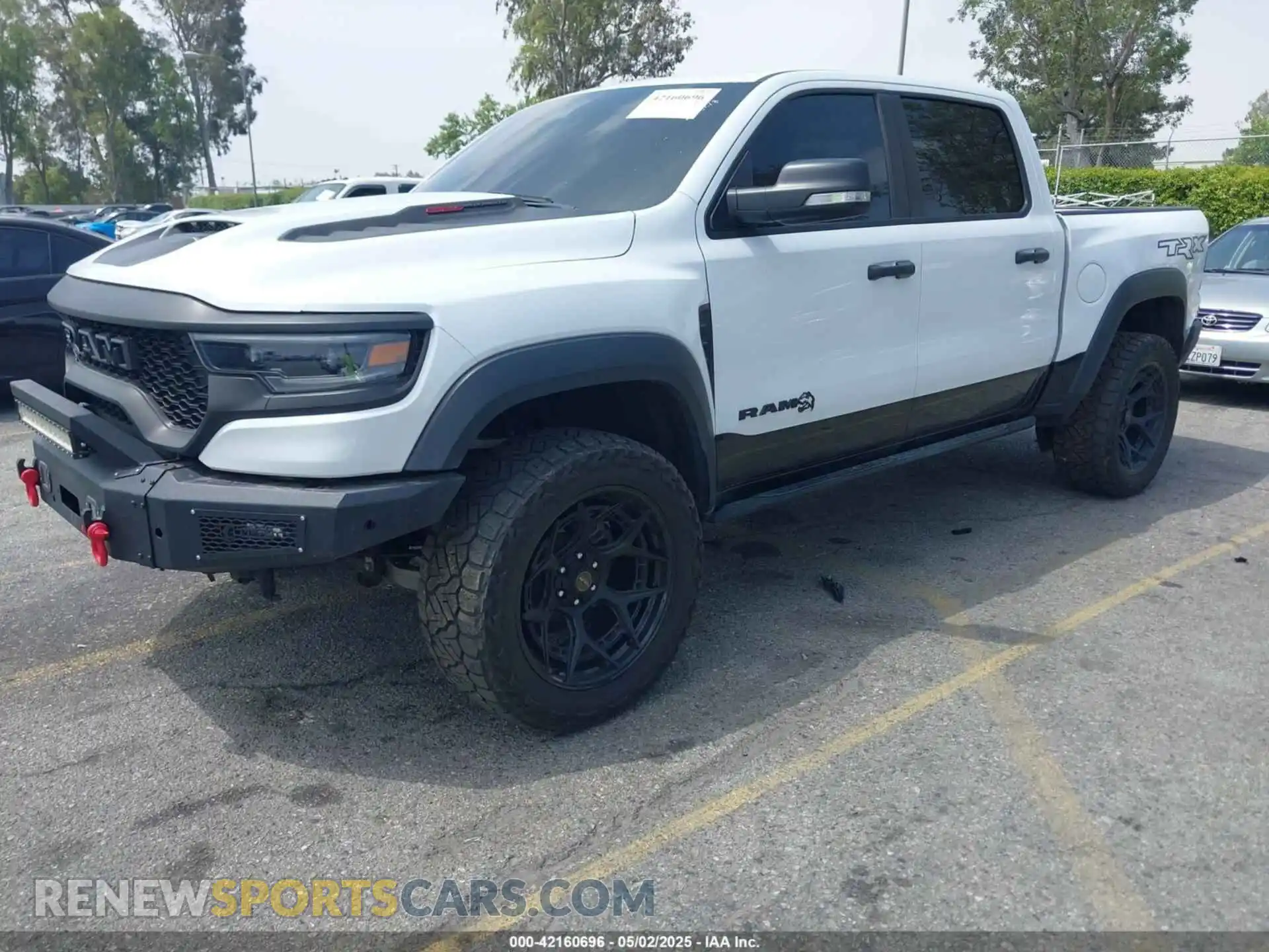 2 fotografías del automóvil dañado 1C6SRFU97NN168472 RAM 1500 2022