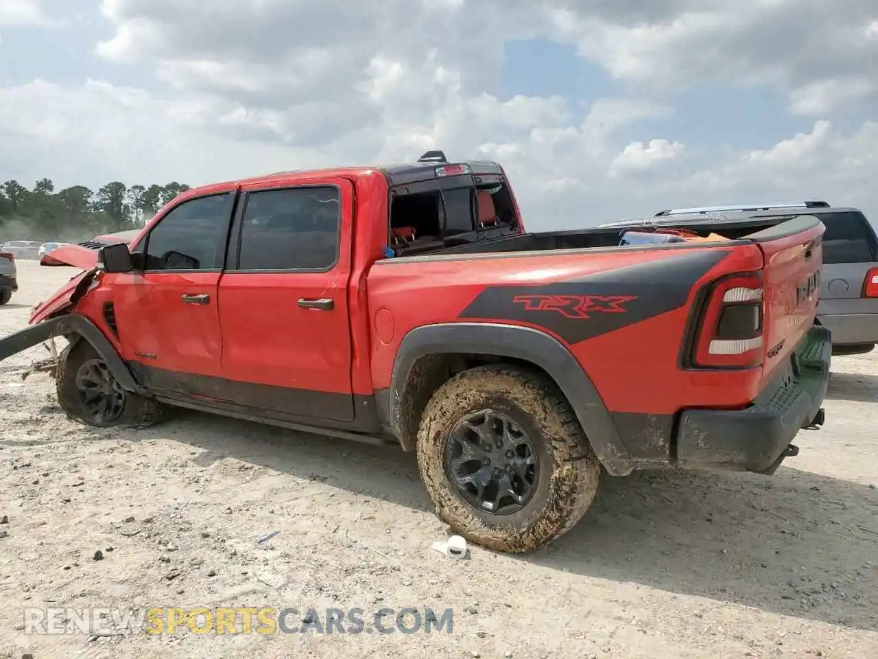 2 Photograph of a damaged car 1C6SRFU97NN240819 RAM 1500 2022