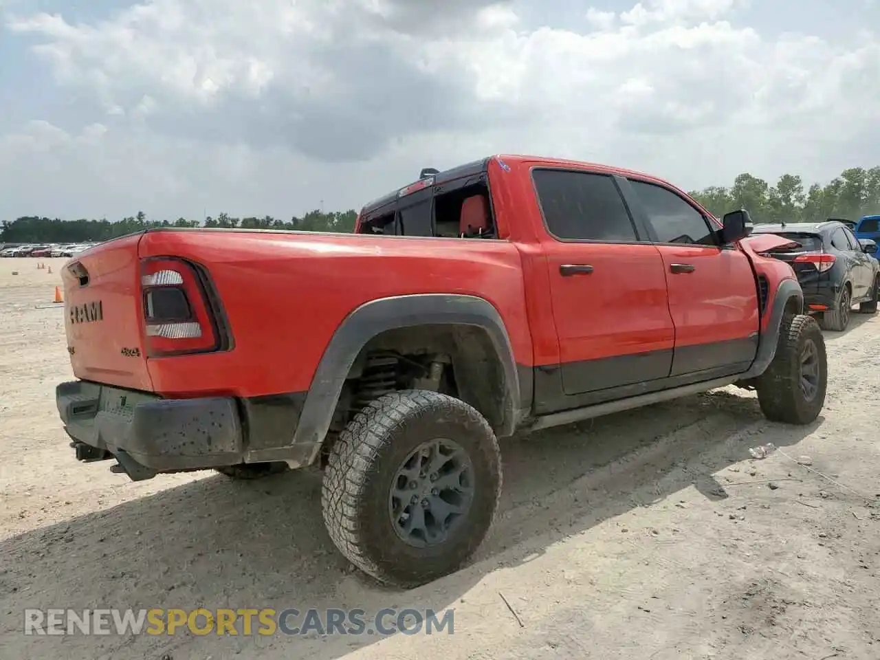 3 Photograph of a damaged car 1C6SRFU97NN240819 RAM 1500 2022