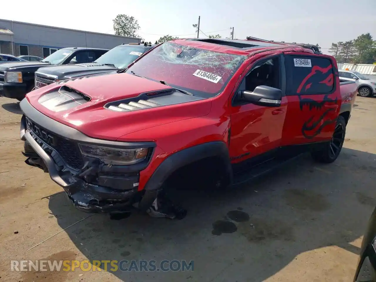 1 Photograph of a damaged car 1C6SRFU97NN335123 RAM 1500 2022