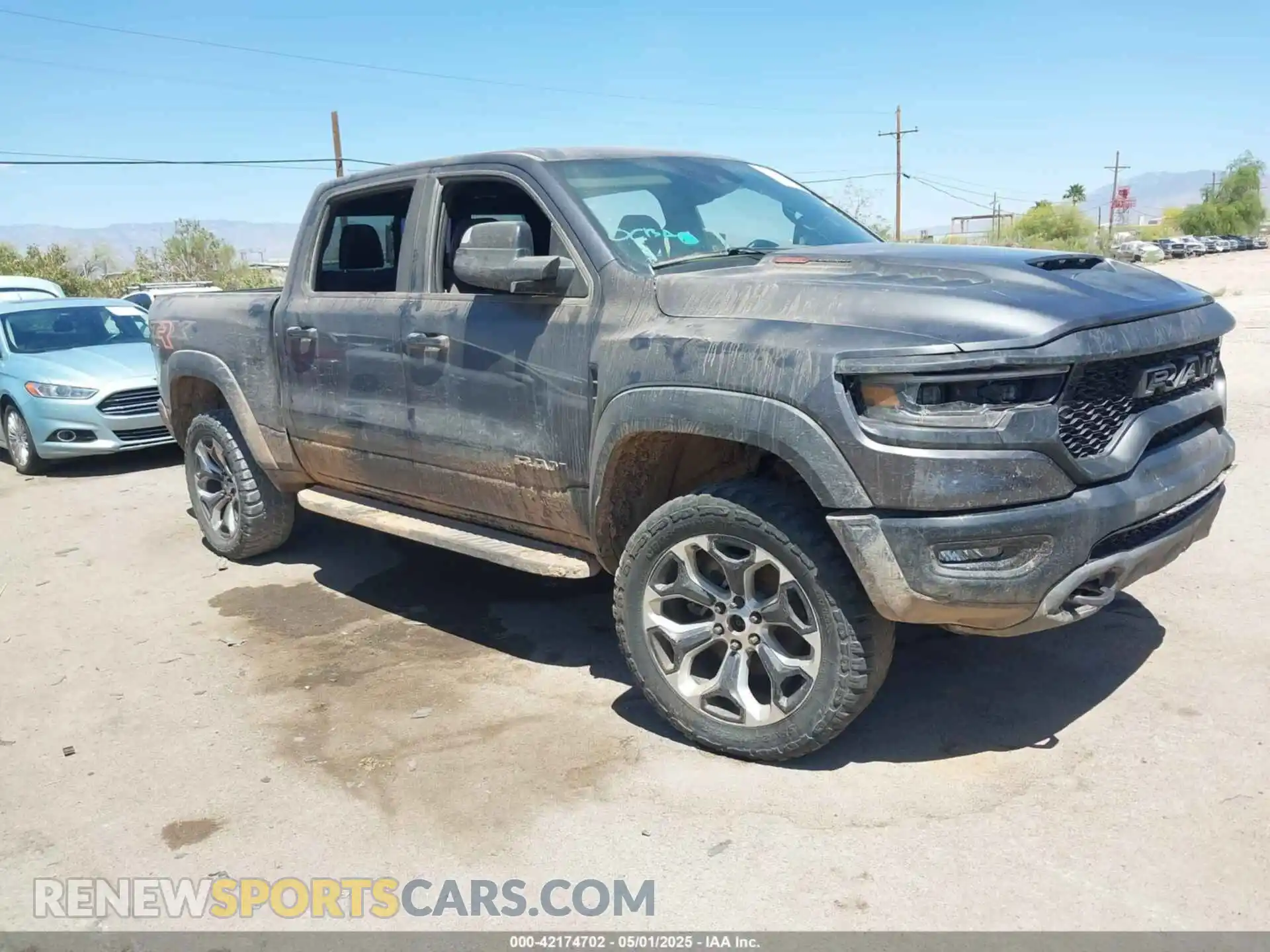1 Photograph of a damaged car 1C6SRFU97NN353587 RAM 1500 2022