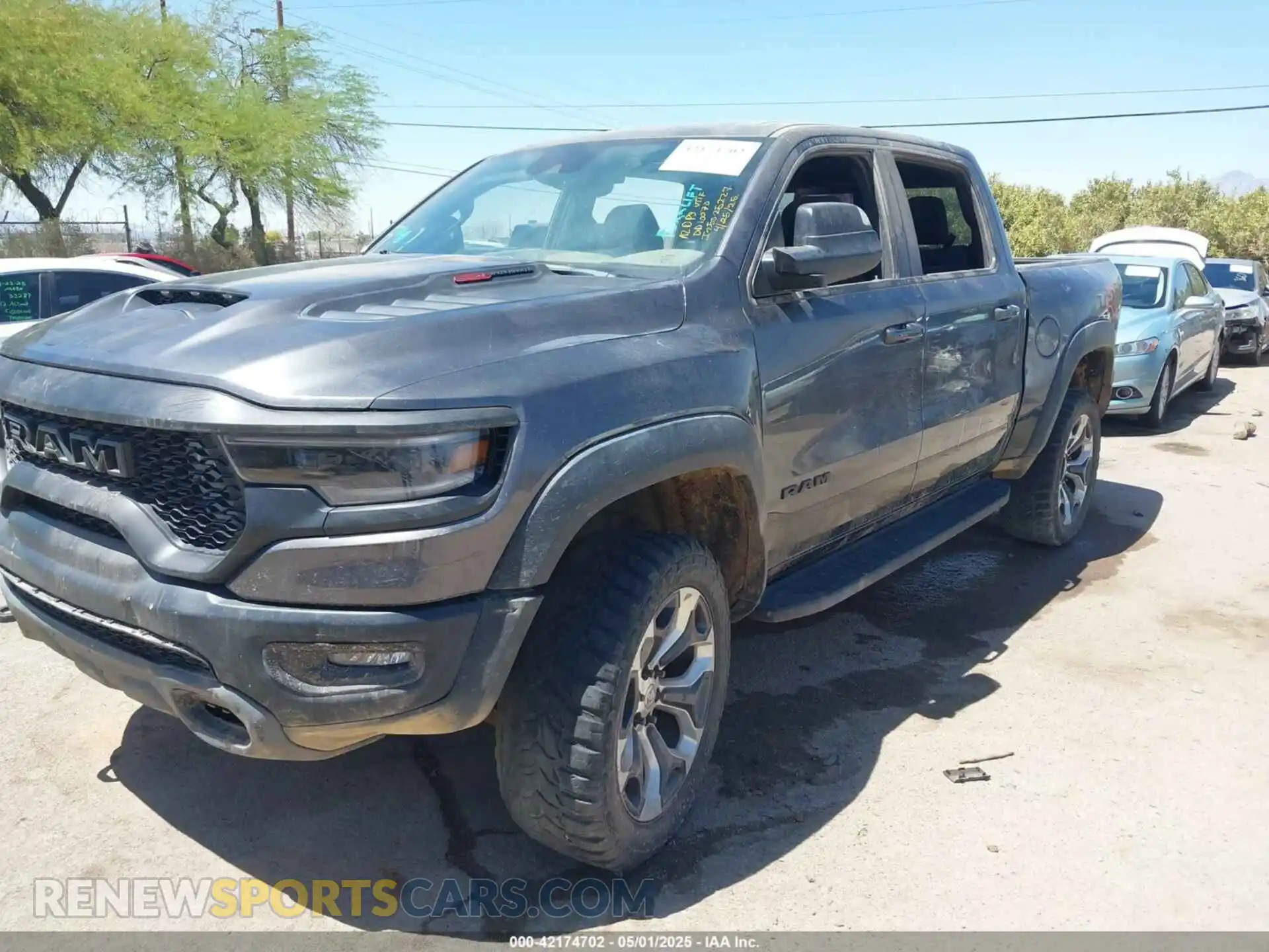 2 Photograph of a damaged car 1C6SRFU97NN353587 RAM 1500 2022