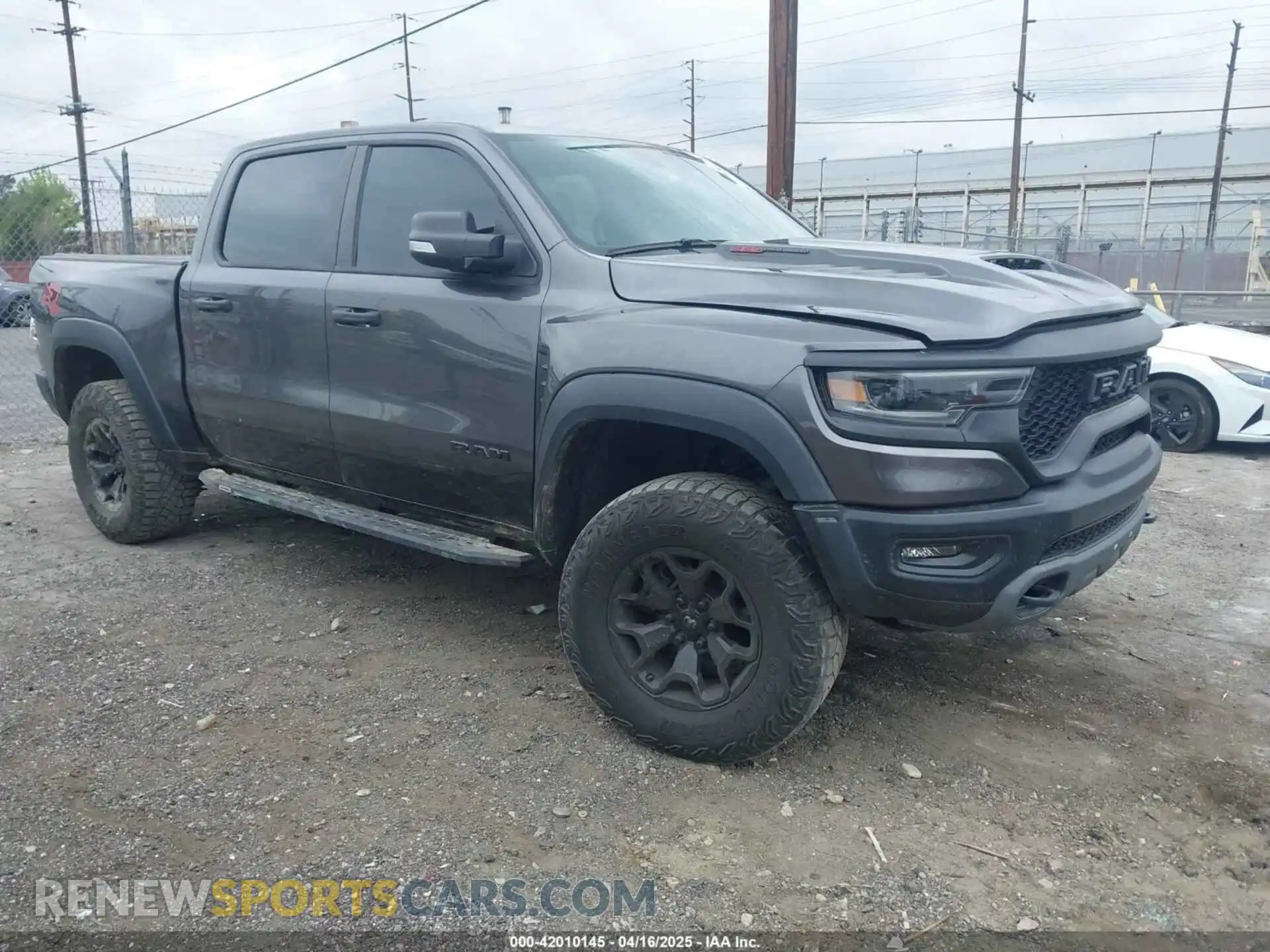 1 Photograph of a damaged car 1C6SRFU98NN334983 RAM 1500 2022
