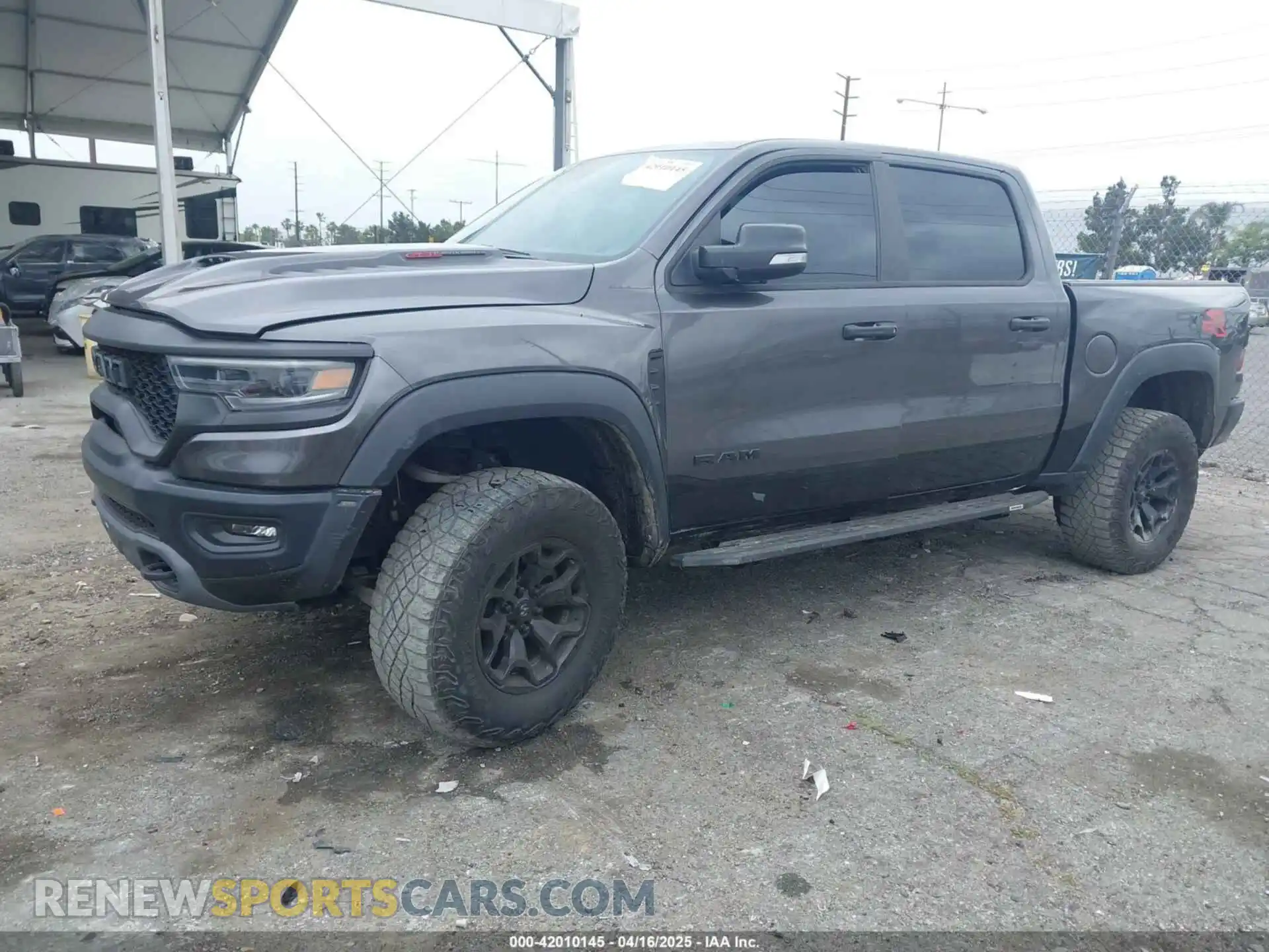 2 Photograph of a damaged car 1C6SRFU98NN334983 RAM 1500 2022