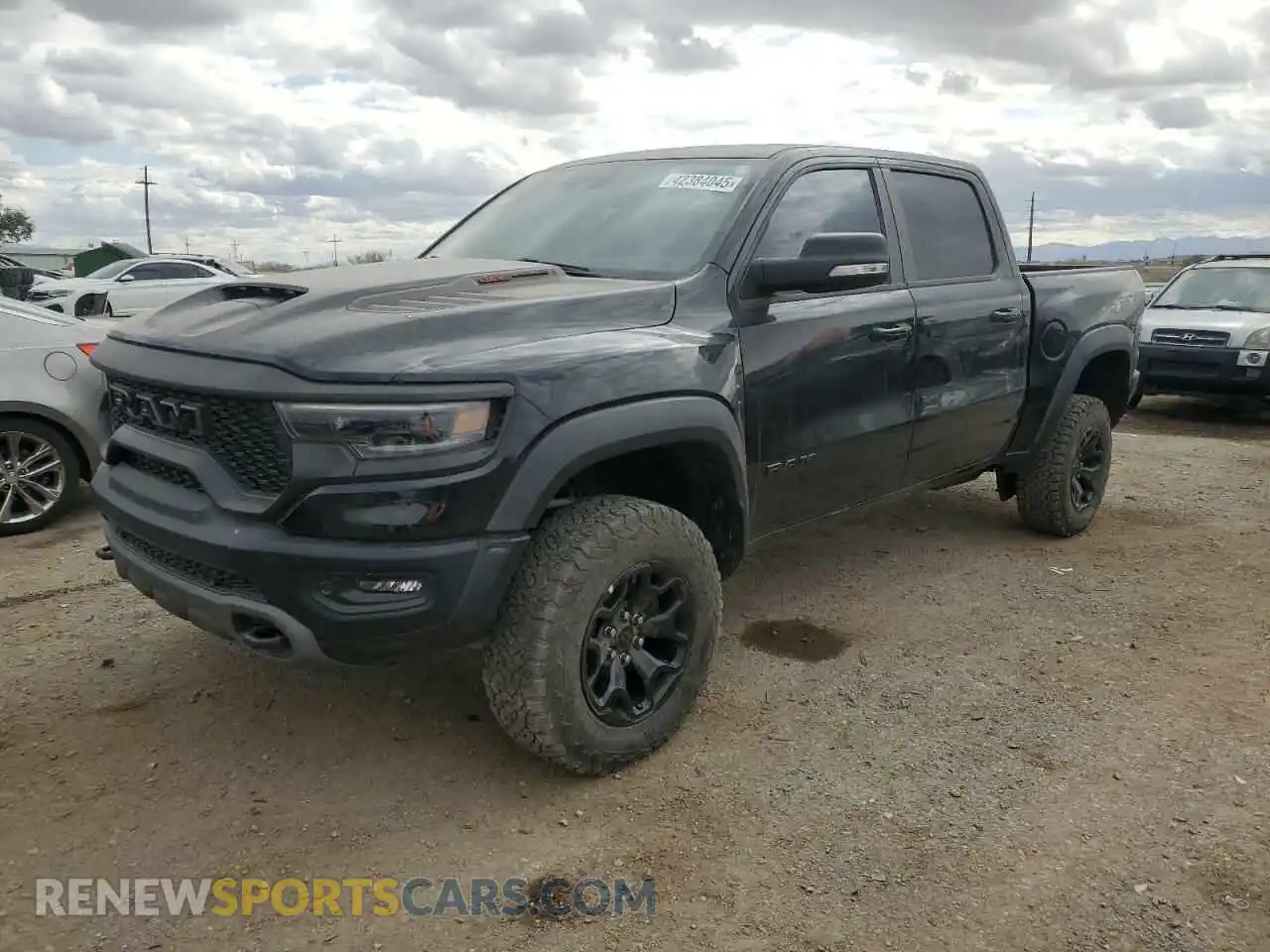 1 Photograph of a damaged car 1C6SRFU98NN345269 RAM 1500 2022