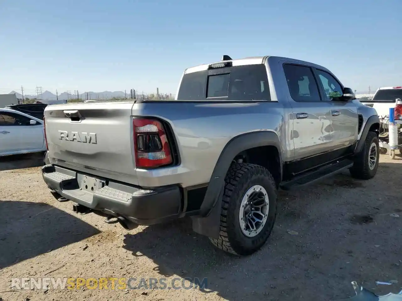 3 Photograph of a damaged car 1C6SRFU99NN120892 RAM 1500 2022