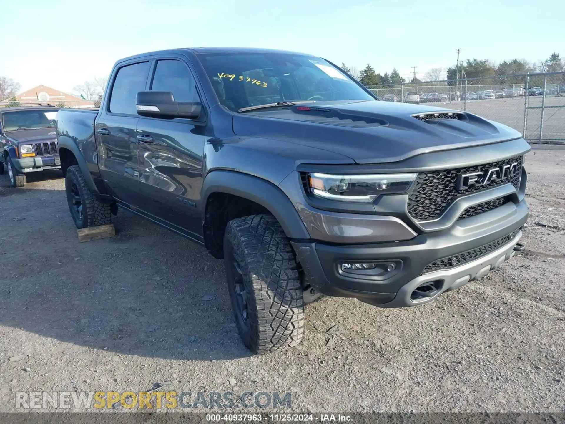 1 Photograph of a damaged car 1C6SRFU99NN144769 RAM 1500 2022