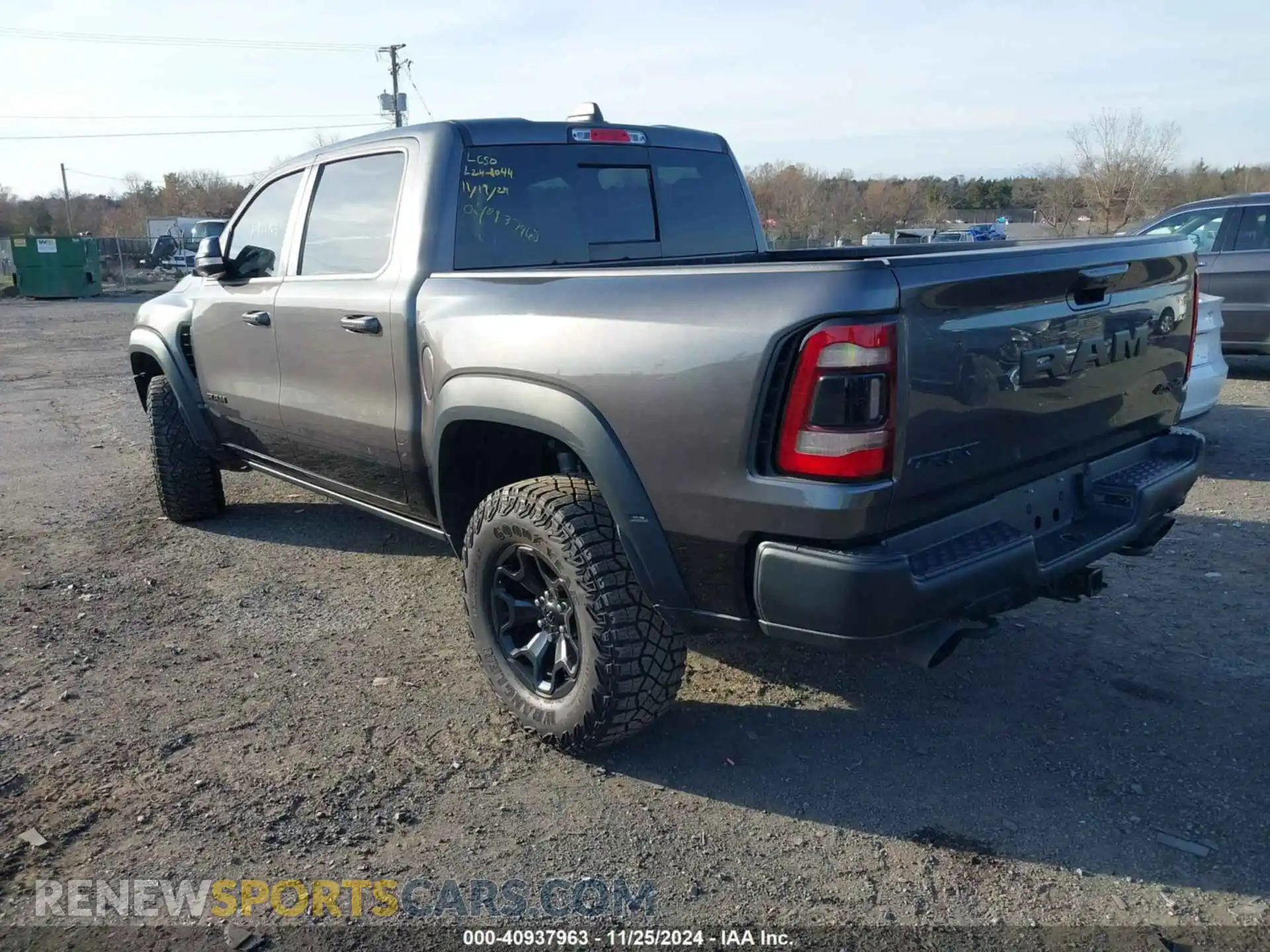 3 Photograph of a damaged car 1C6SRFU99NN144769 RAM 1500 2022