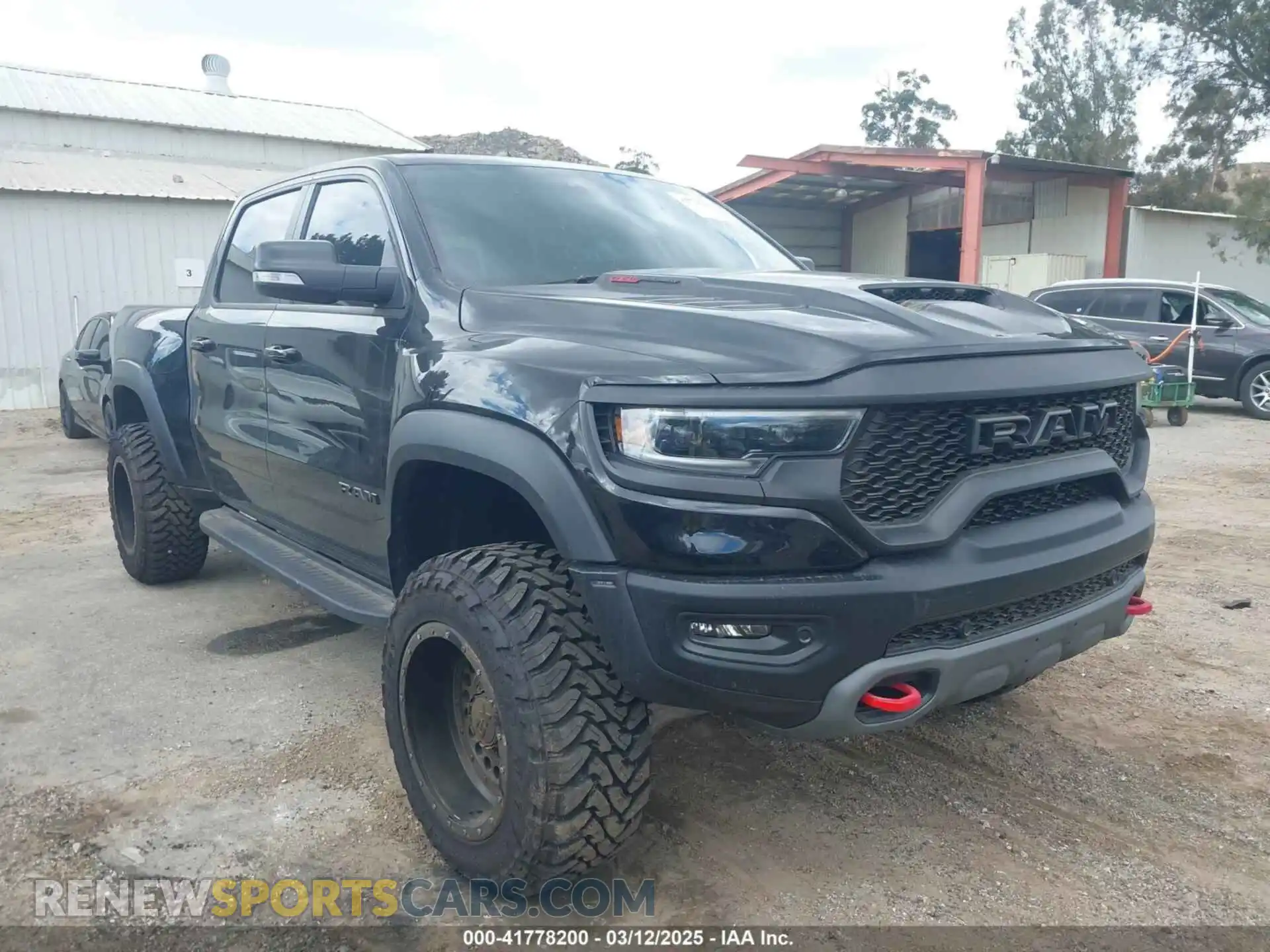 1 Photograph of a damaged car 1C6SRFU99NN230521 RAM 1500 2022